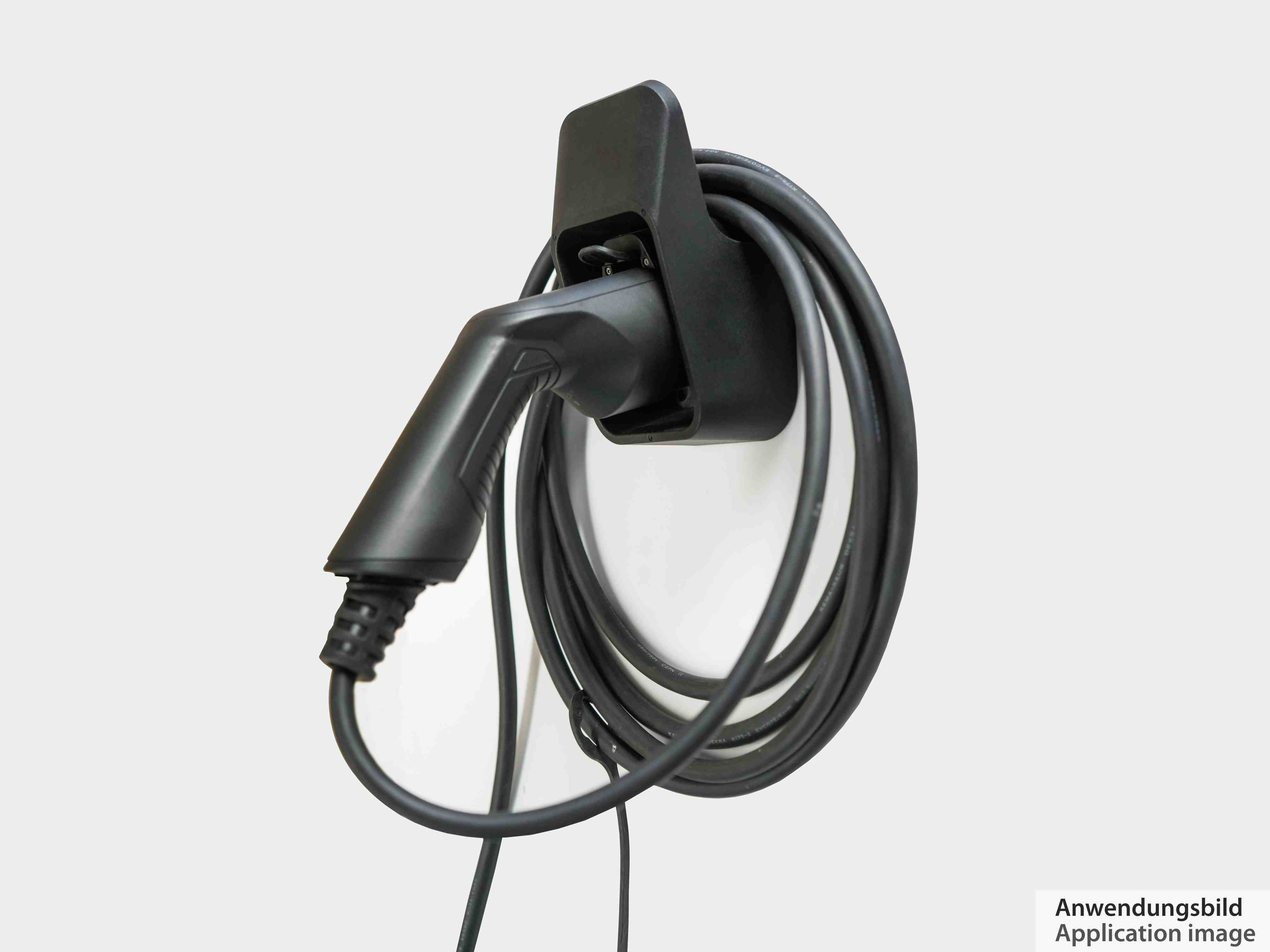 Magnetischer Autotelefonhalter in einer Box. Die Box ist weiß mit 'gear'.