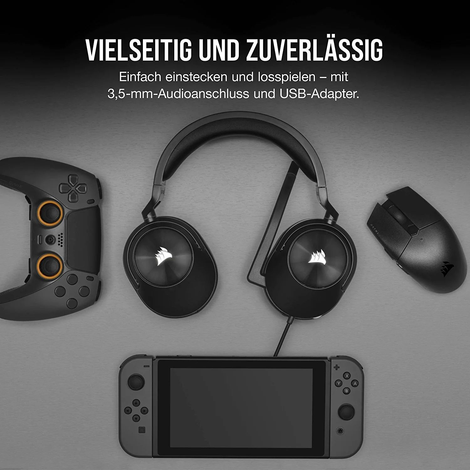Gaming-Setup: Controller, Headset, Maus und Switch. Alles auf grauer Oberfläche.