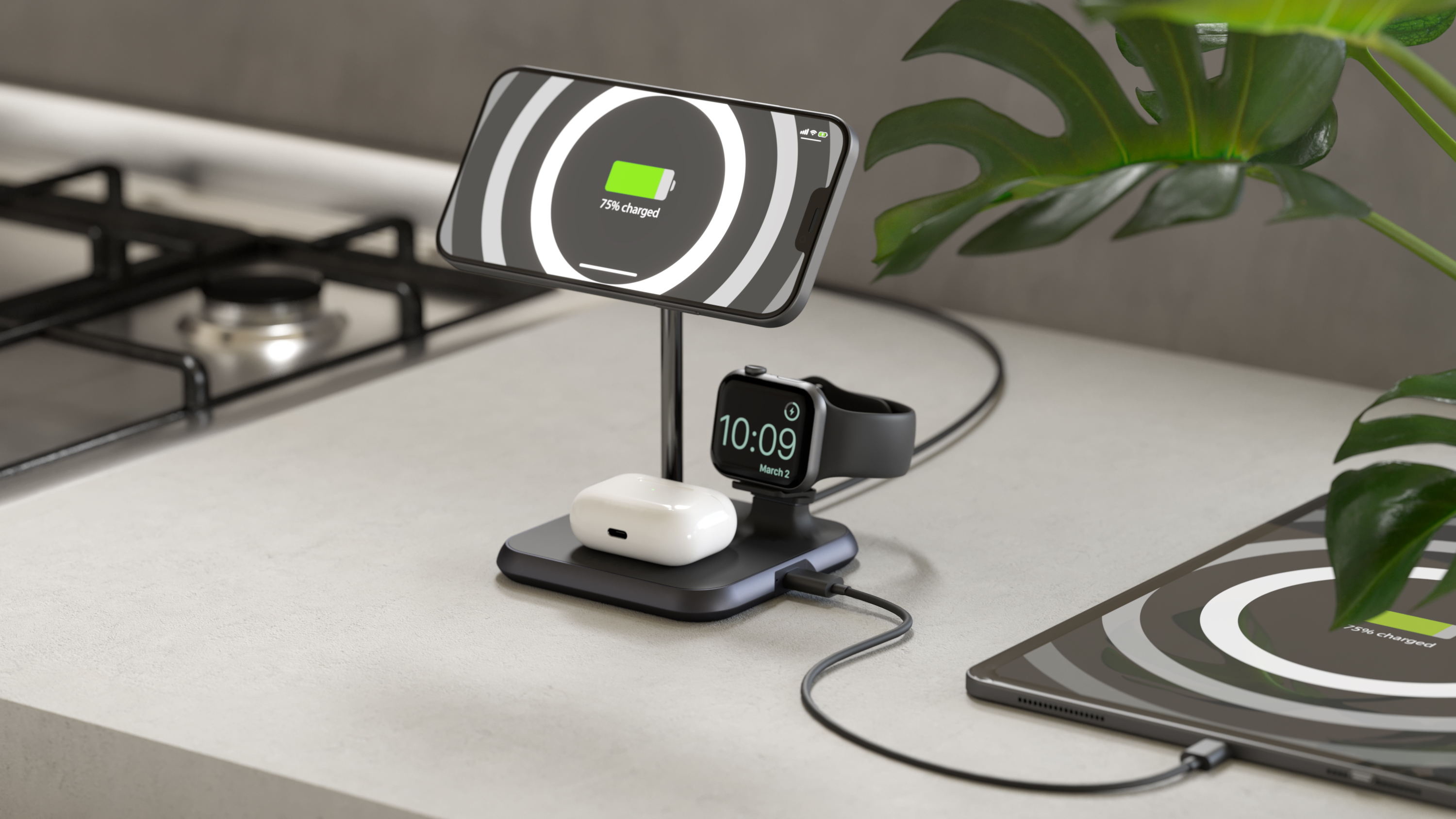 Una stazione di ricarica con un telefono, un orologio e AirPods. Tutti sono in carica.