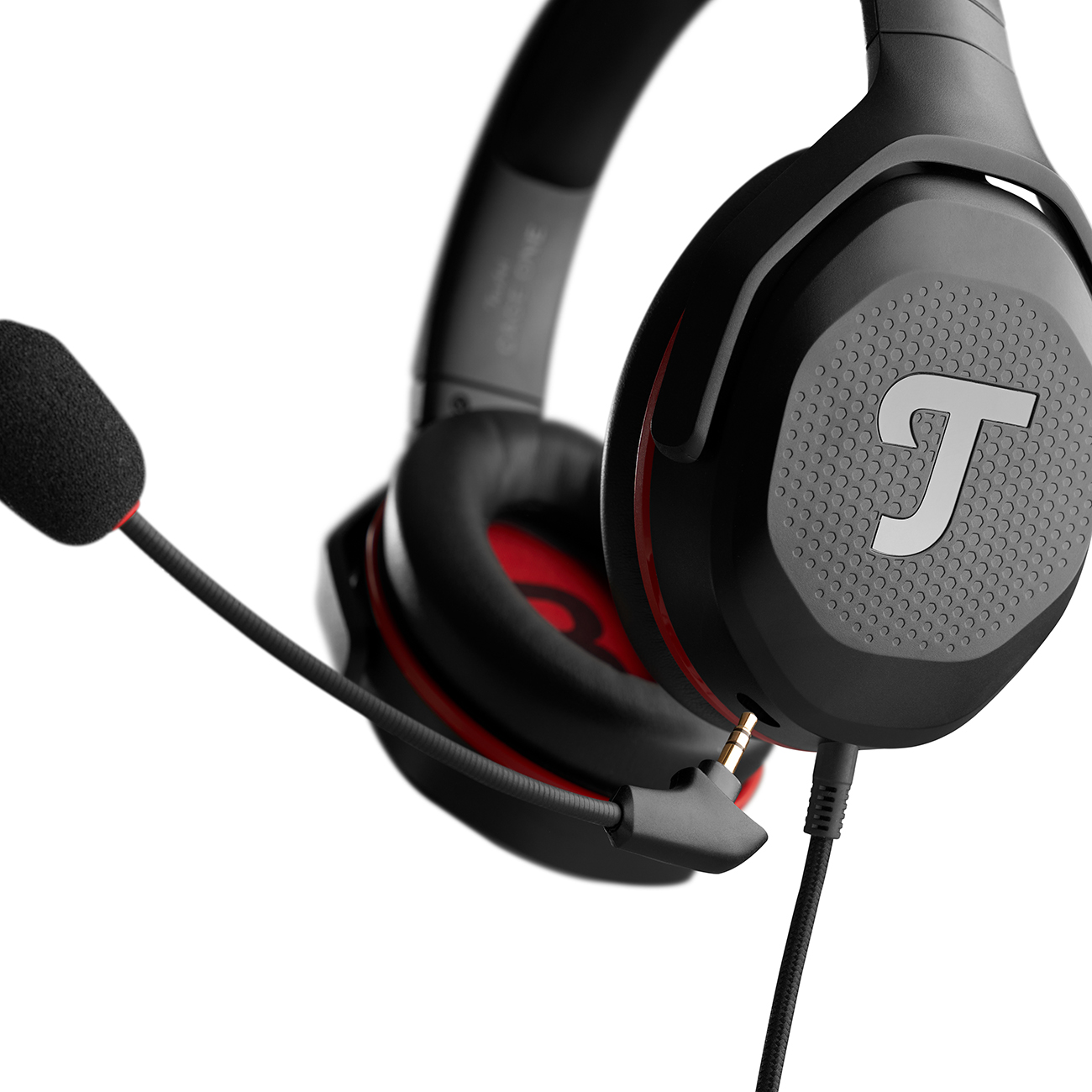 Cuffie da gioco nere con microfono. I padiglioni auricolari hanno la lettera 'T'.