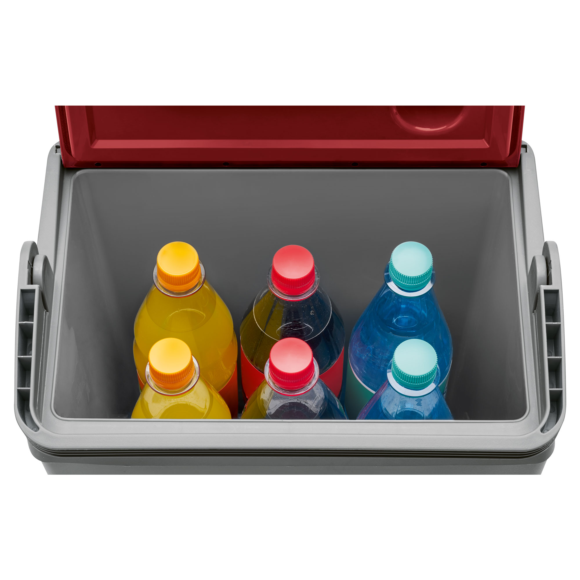 Otwarta chłodziarka z sześcioma butelkami sody. Butelki mają żółte, czerwone i niebieskie zakrętki, różne kolory.