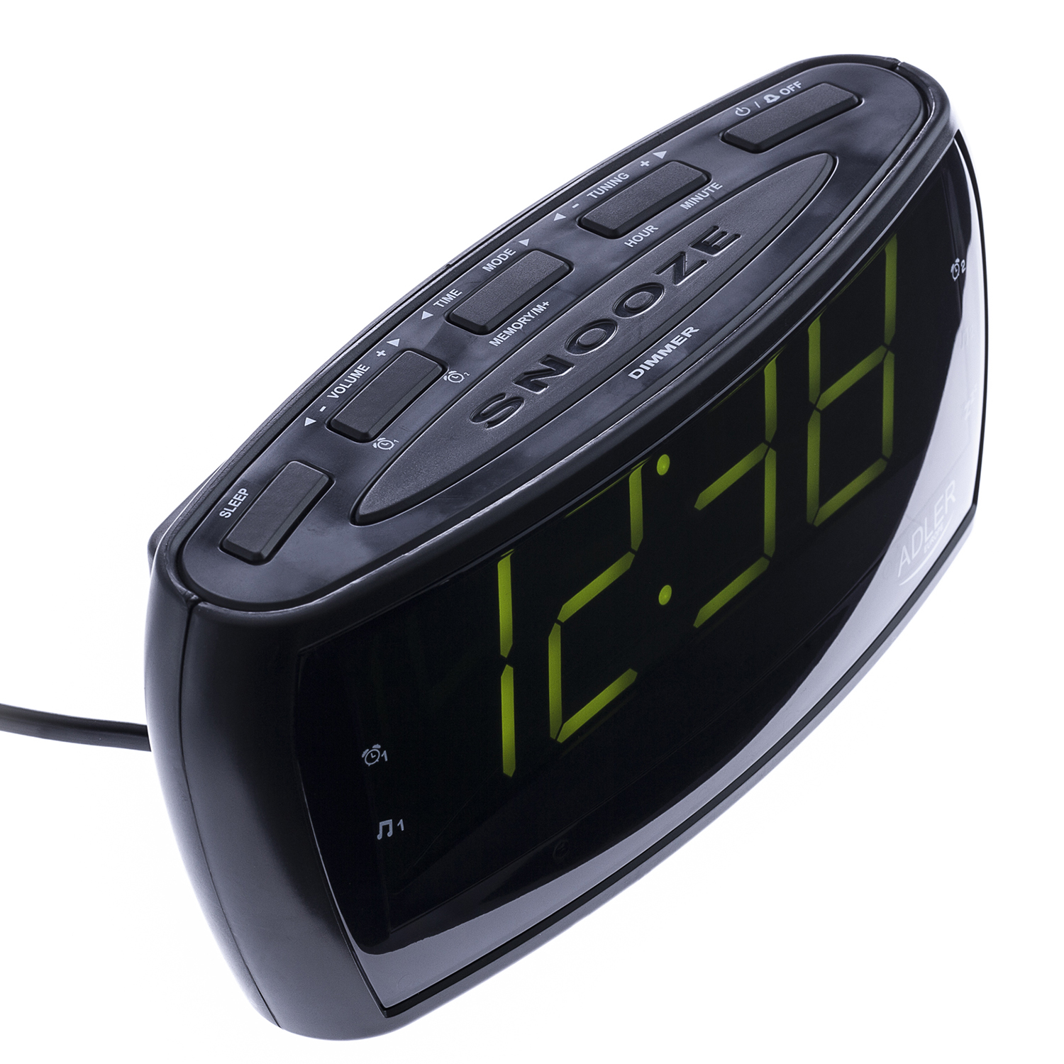Reloj despertador digital negro con dígitos verdes mostrando 12:36. Tiene botones para configurar y posponer.