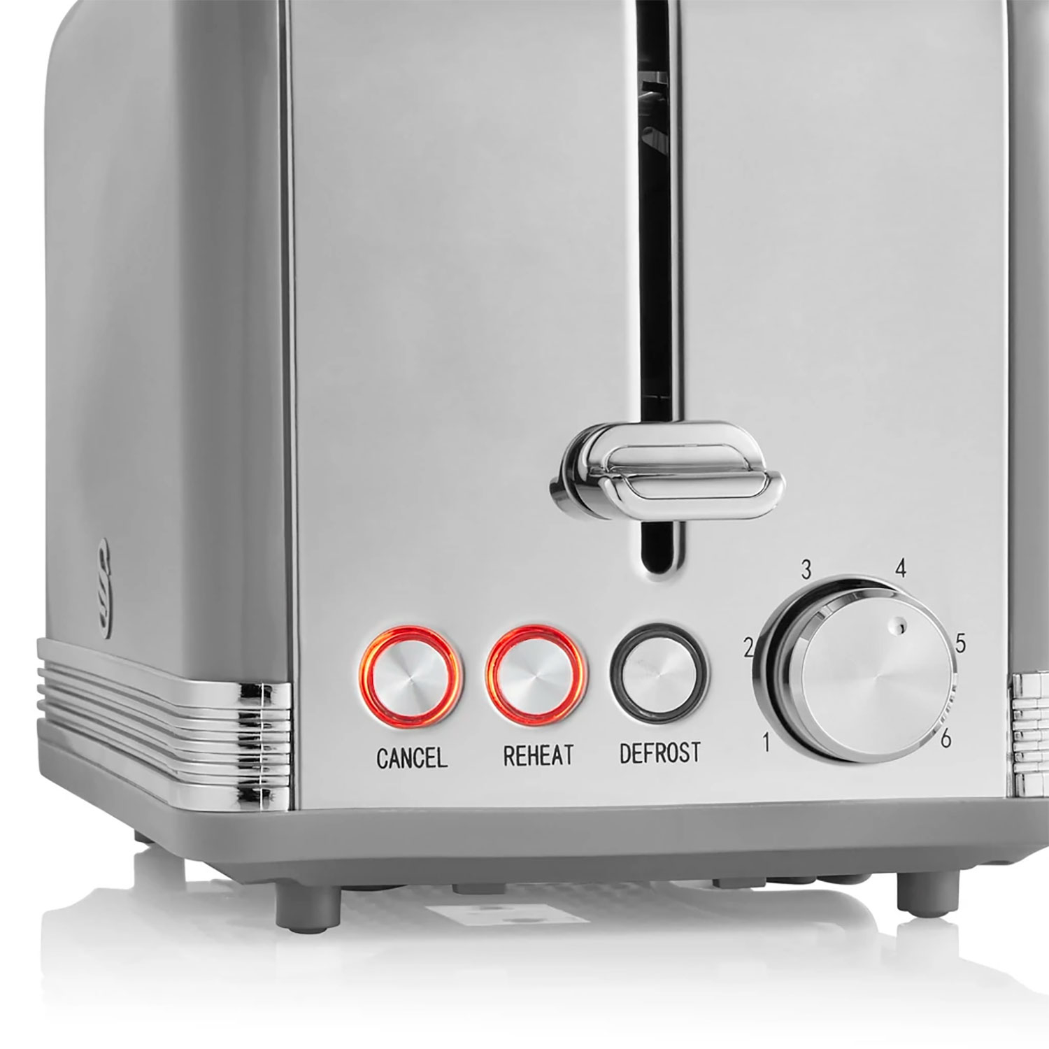 Tostapane argentato con pulsanti e manopola. Pulsanti: CANCEL, REHEAT, DEFROST. Manopola numeri 1-6. Accenti cromati.