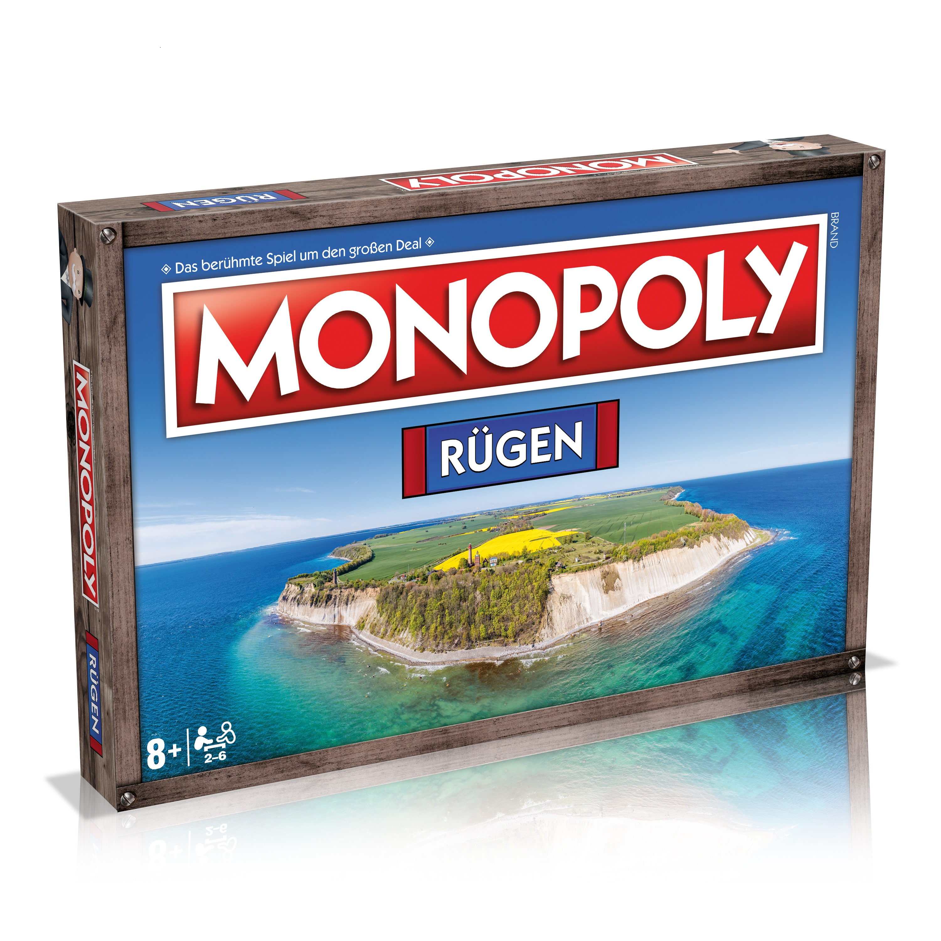 Monopoly-Brettspielbox mit einem Bild einer Insel. Weißer Hintergrund.