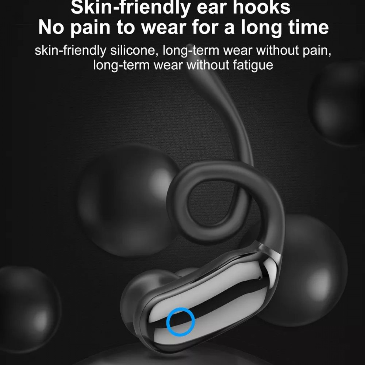 Czarny haczyk na ucho ze srebrnym akcentem, otoczony czarnymi kulami, na ciemnym tle.