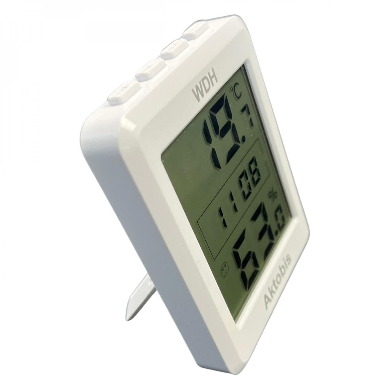 Ein weißes digitales Temperatur- und Feuchtigkeitsmessgerät mit 19,7 °C, 11:08 und 63,0 %.