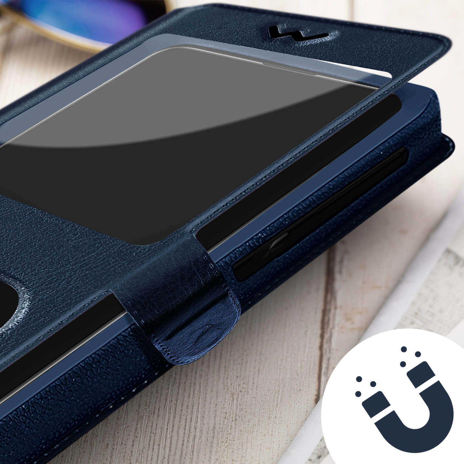 Custodia per telefono in pelle blu, aperta per mostrare lo schermo. Icona magnete.