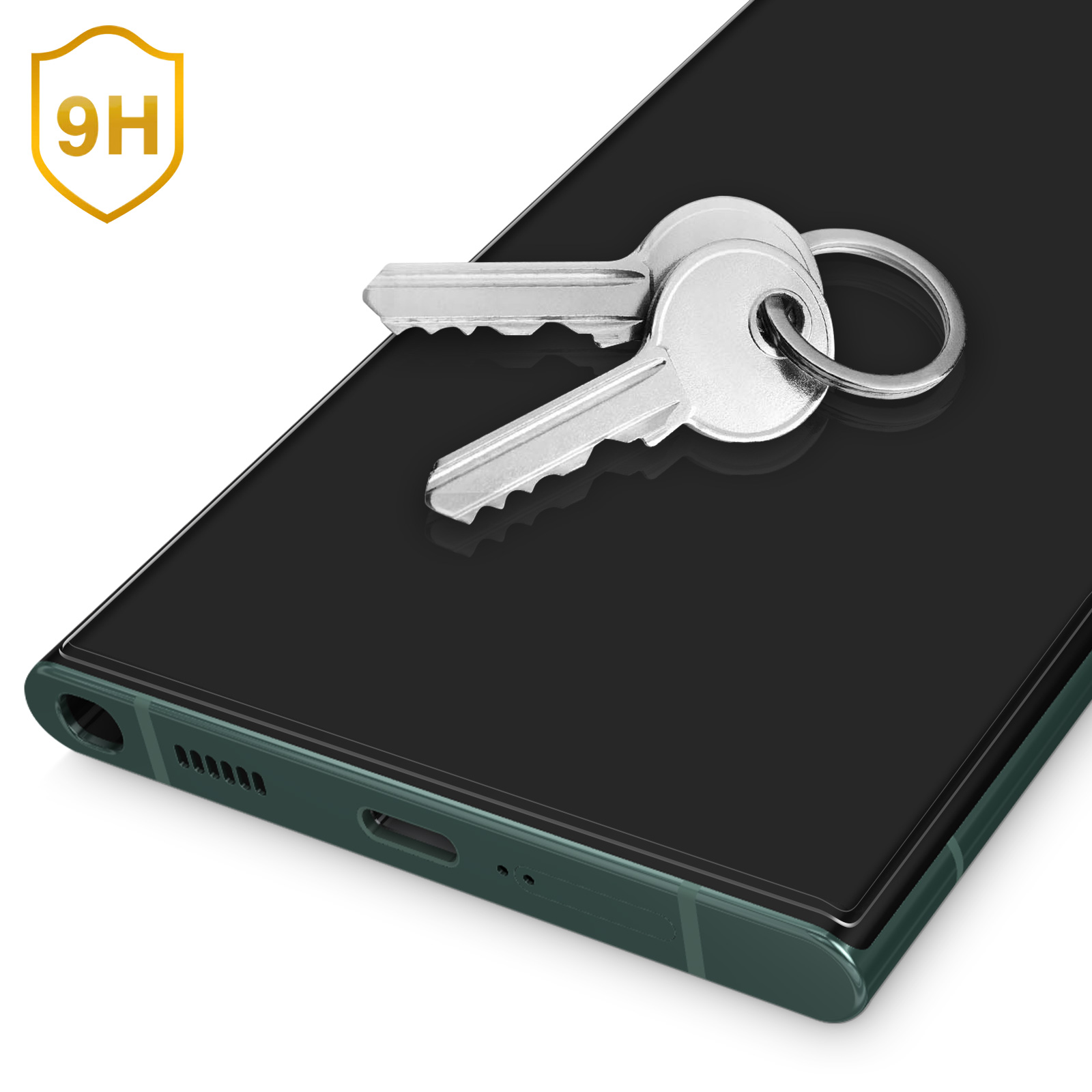 Schermo del telefono con chiavi sopra, con un'etichetta di protezione 9H.