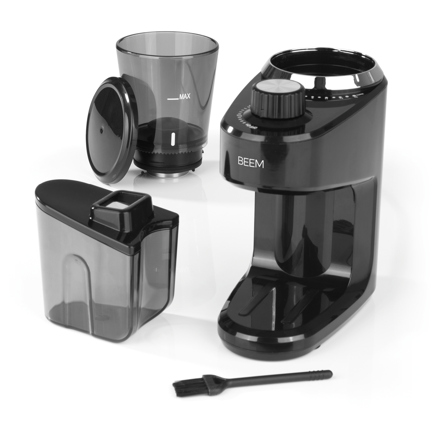 Schwarze Kaffeemühle zerlegt, mit Bürste.
