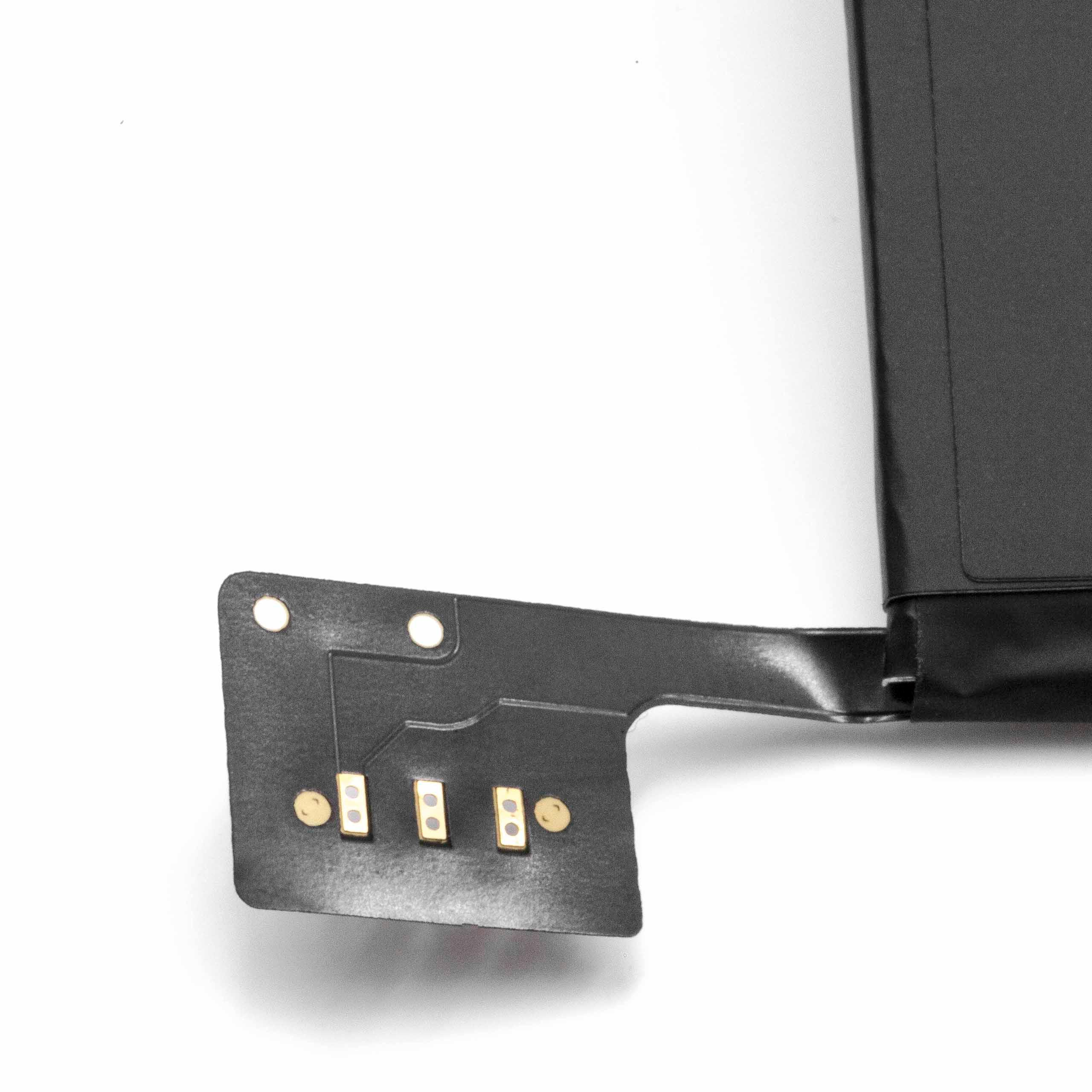 Schwarze rechteckige Batteriekomponente mit drei Goldkontakten an einem schwarzen Stecker auf weißer Oberfläche.
