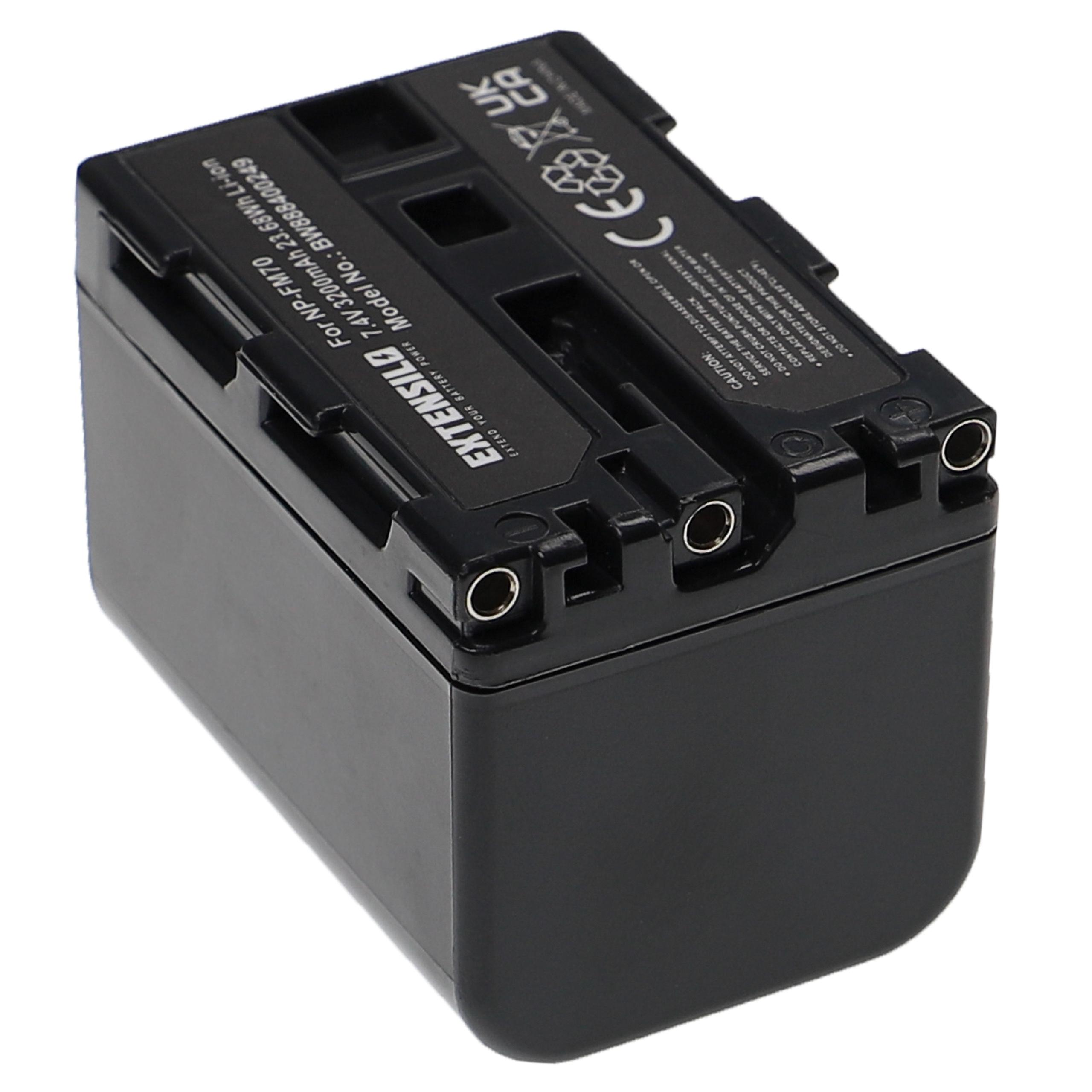 Schwarzes Batteriepack mit Etiketten und Anschlussstiften auf weißer Oberfläche.