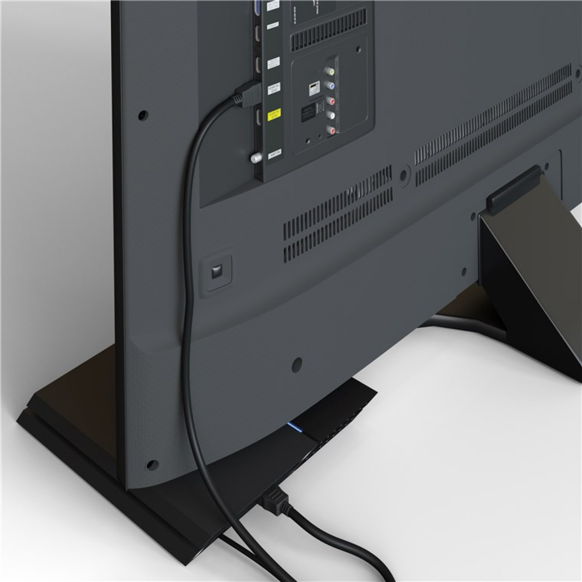 Rückansicht eines Fernsehers mit schwarzem Sockel, Kabel angeschlossen.
