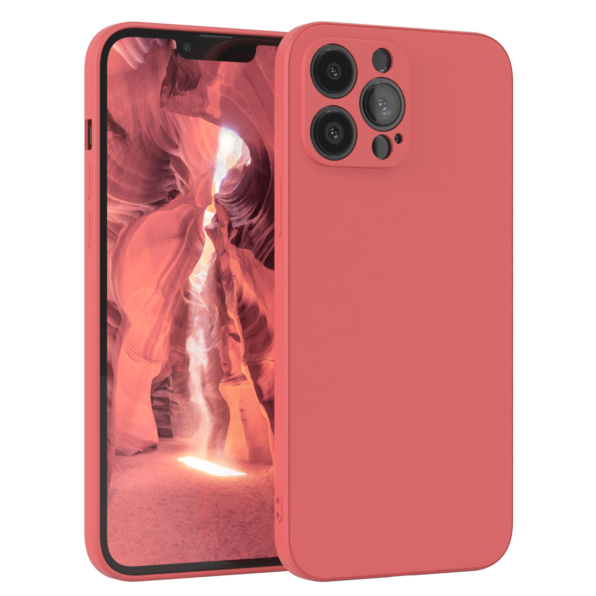 Korallenfarbene Handyhülle mit Telefon, das eine Canyon-Ansicht zeigt. Schwarzer Rand.