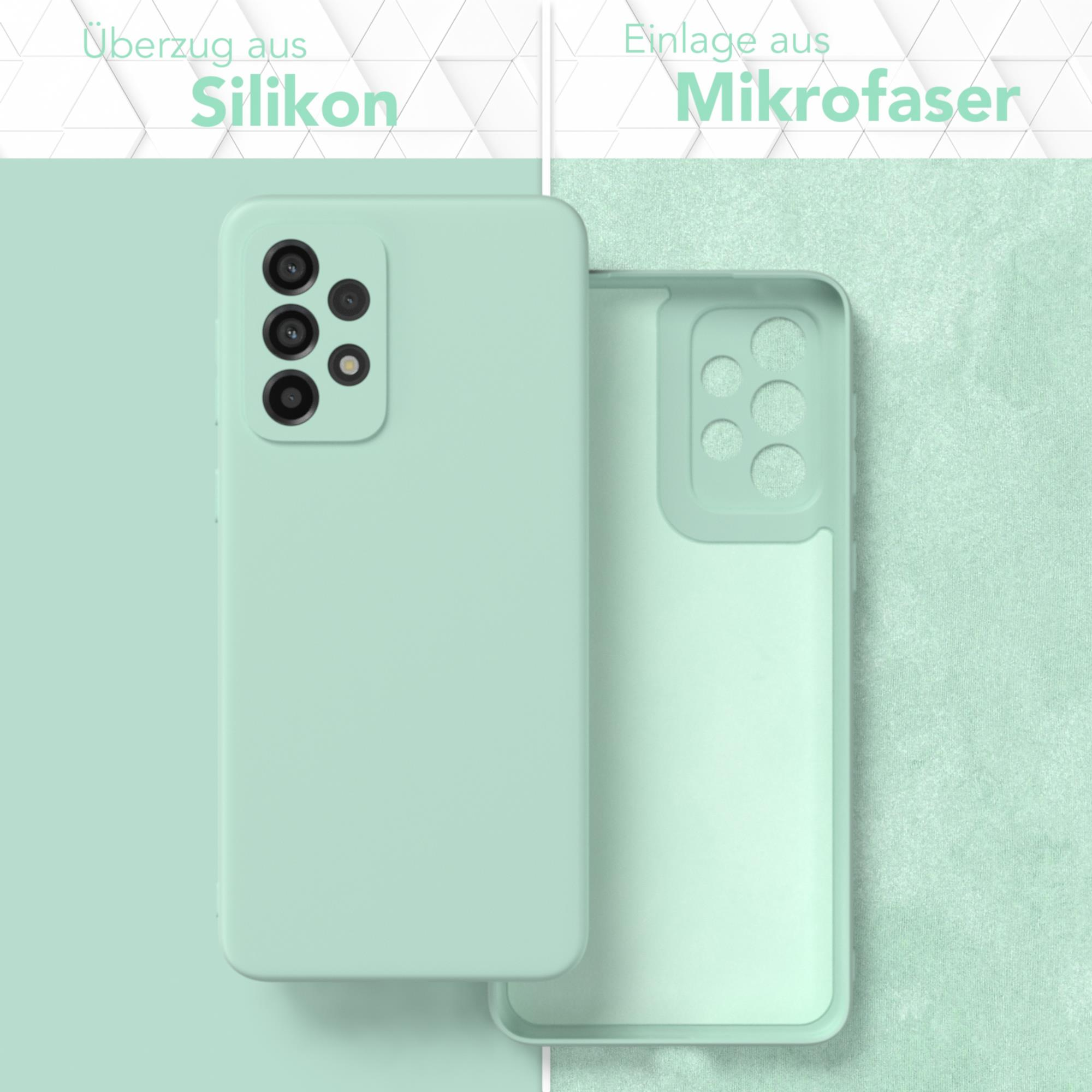 Mintgrüne Handyhülle mit einem Telefon links und einer leeren Hülle rechts.