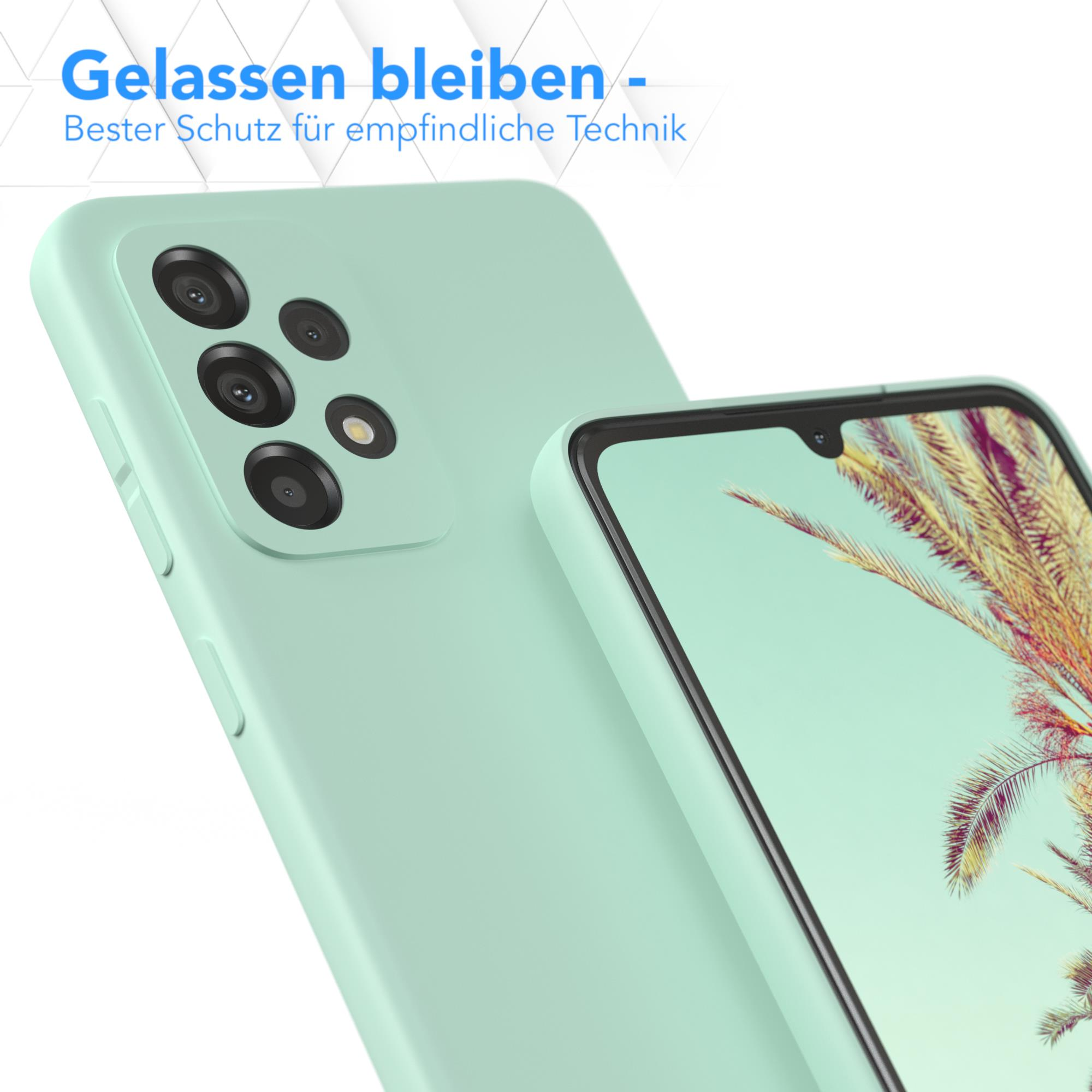 Eine mintgrüne Handyhülle mit einem Telefon in der Hülle.