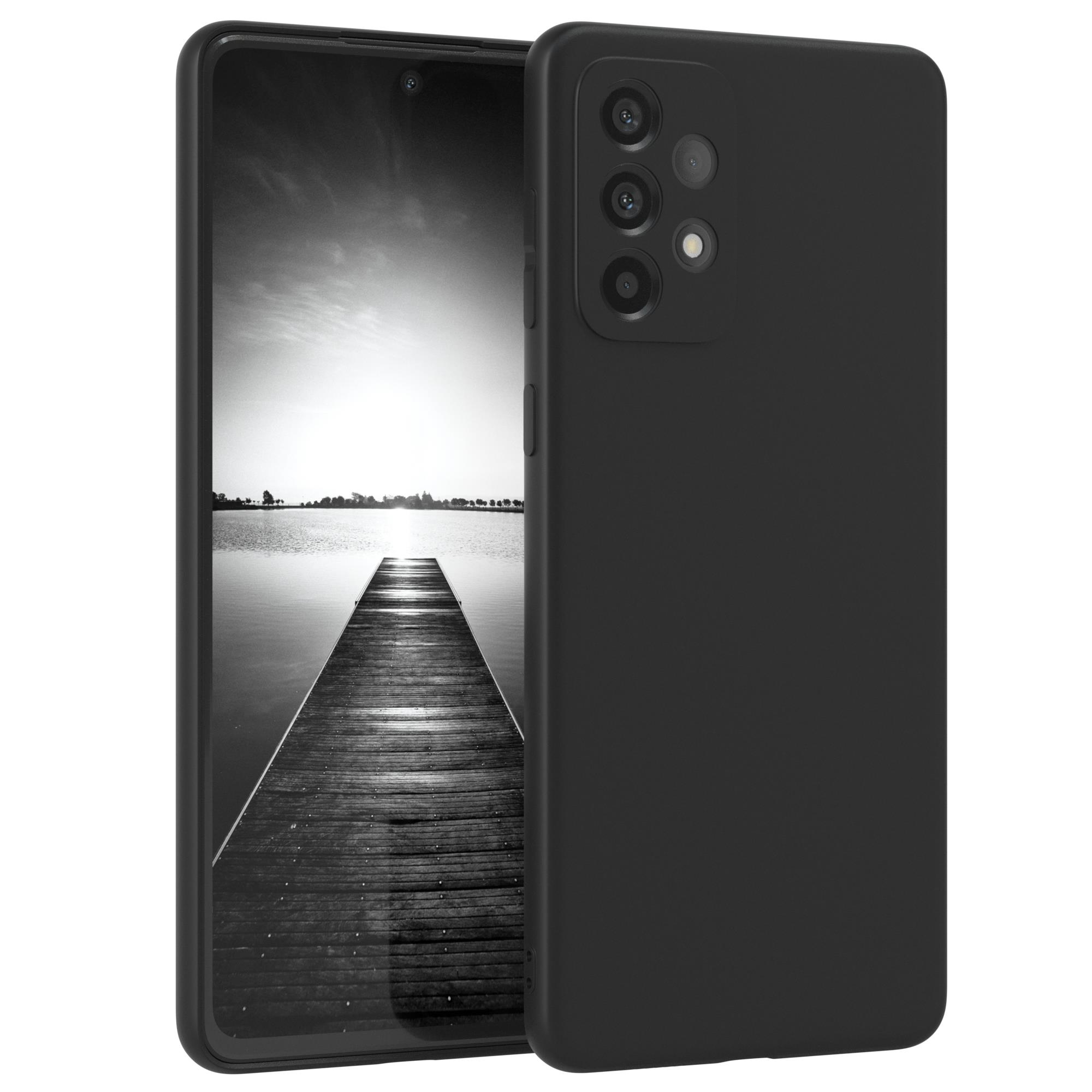 Schwarzes Telefon mit einem Bildschirm, der ein Landschaftsbild zeigt, und eine schwarze Handyhülle daneben.