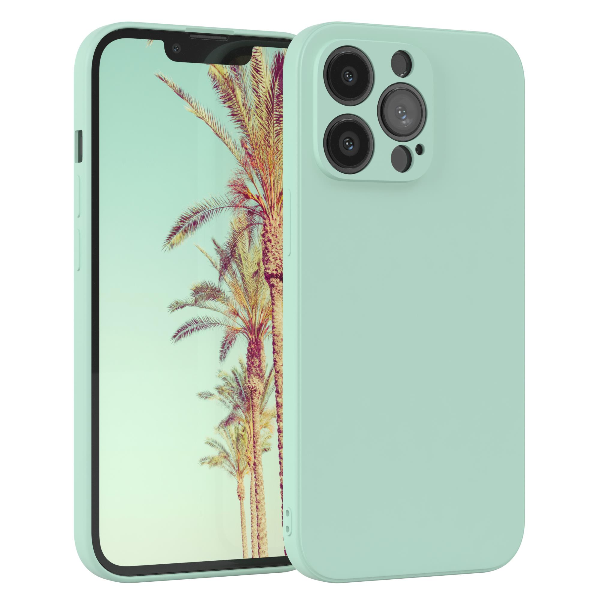 Minzgrüne Handyhülle mit Telefon, das eine tropische Strandszene zeigt.