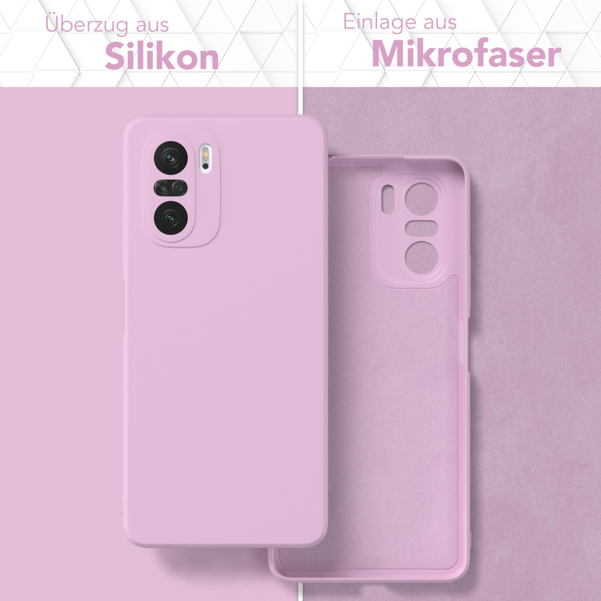 Eine rosa Handyhülle. Die äußere Hülle ist rosa und die innere ist rosa Mikrofaser.
