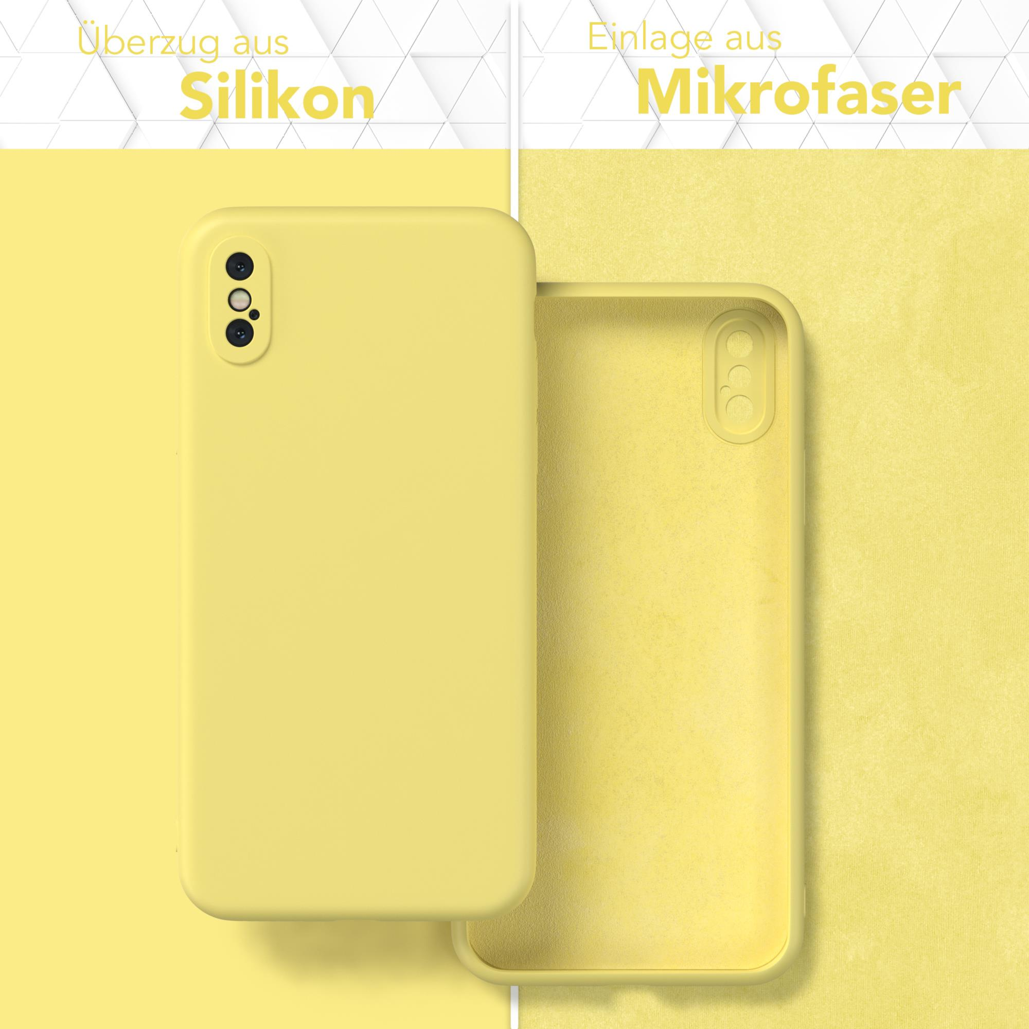 Gelbe Handyhülle mit Telefon und Mikrofaser. Auf weißem Hintergrund.