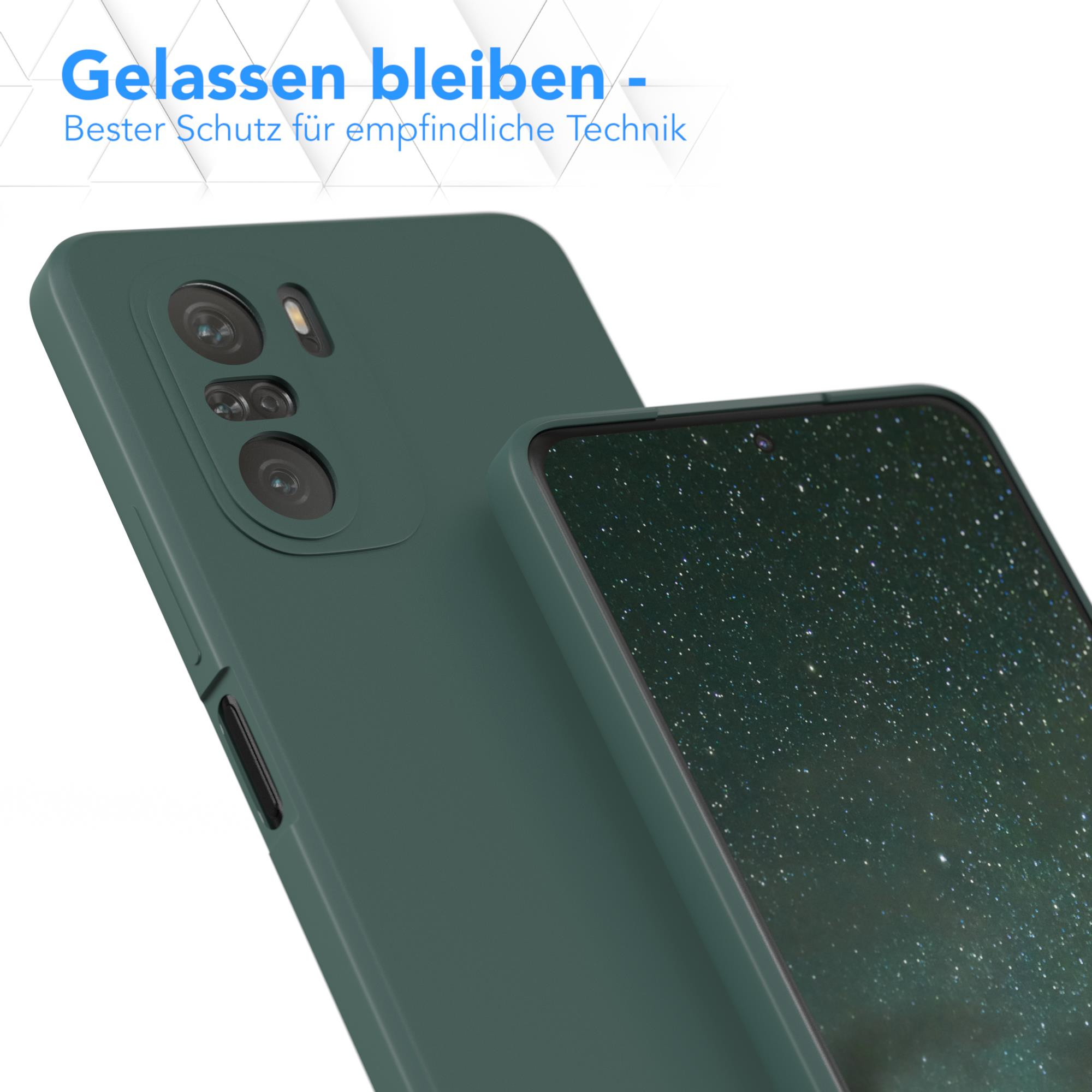 Nahaufnahme einer grünen Handyhülle und eines Handys. Text oben im Bild.
