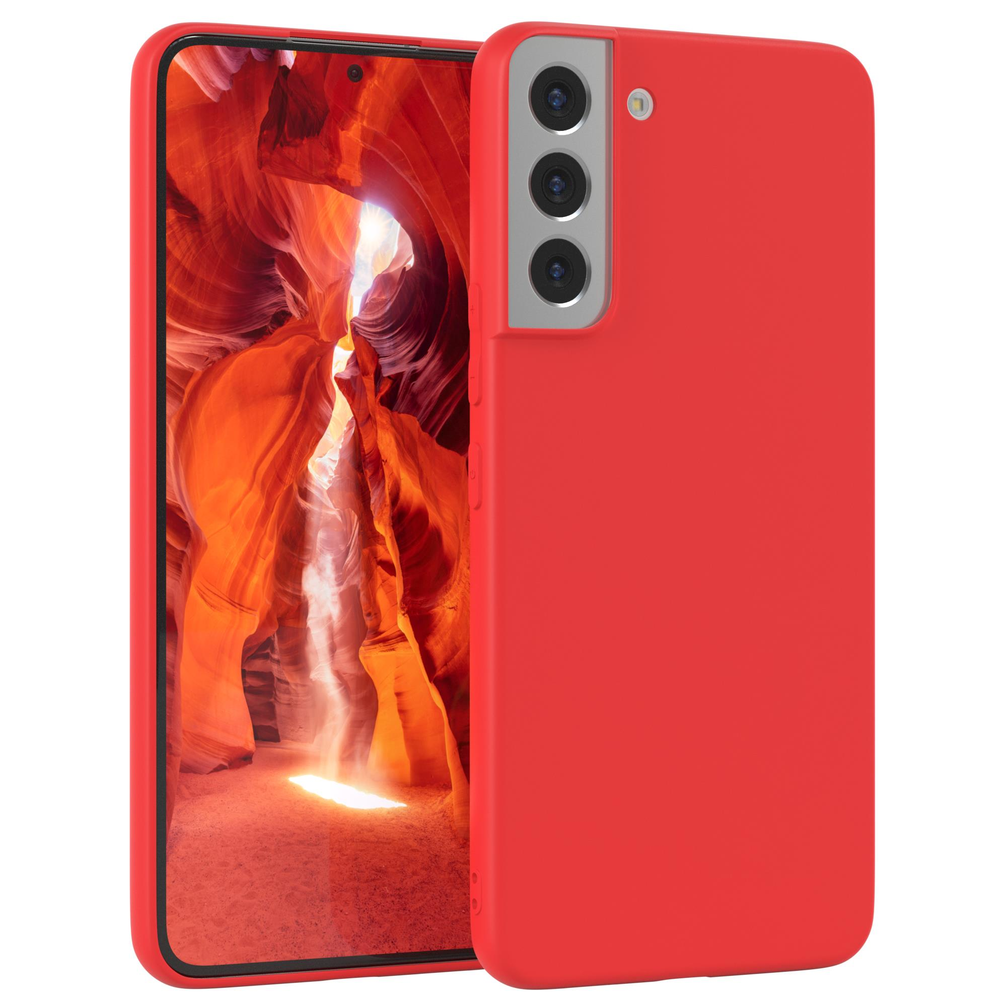 Rotes Telefon in Hülle. Der Bildschirm zeigt rote Felsformation.