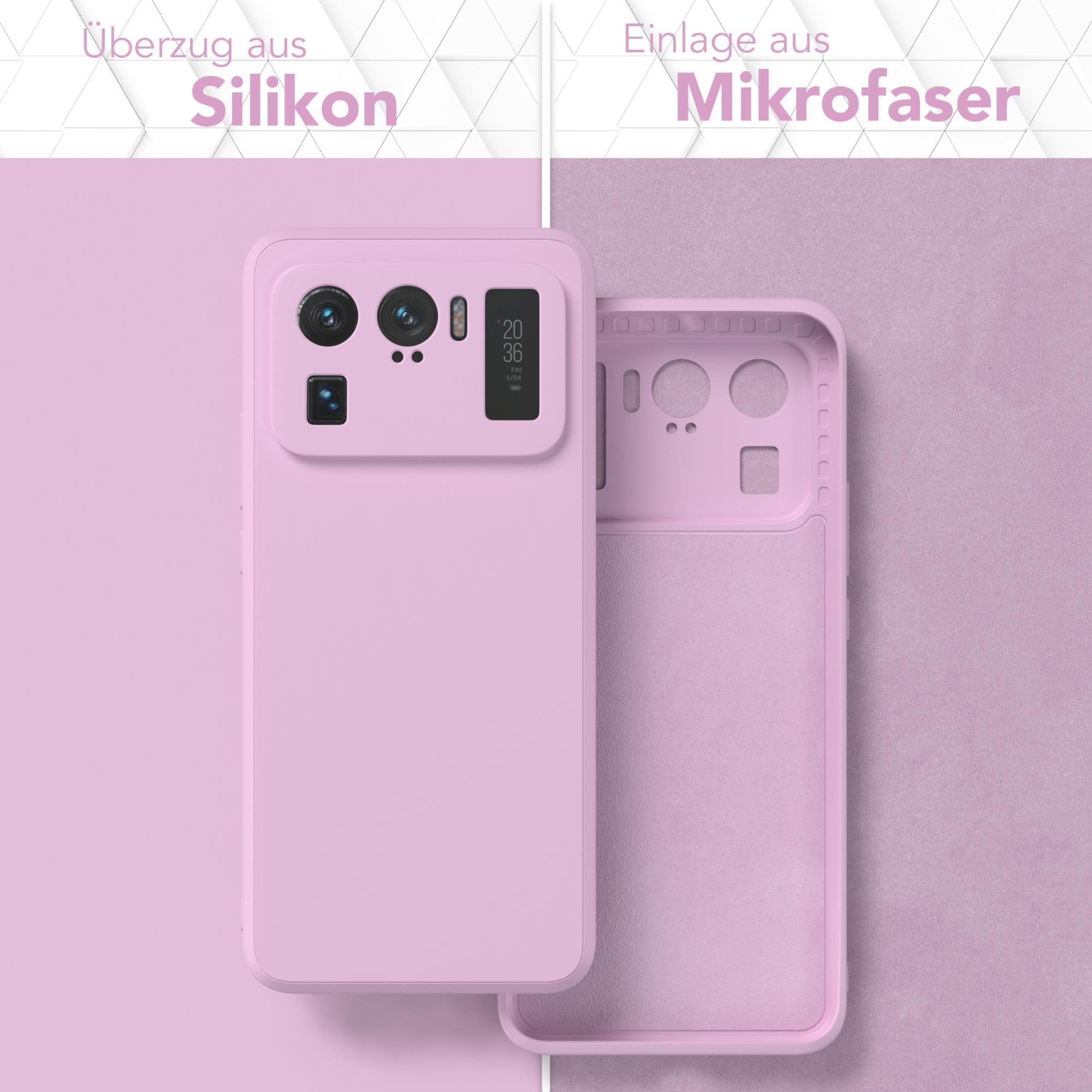 Rosa Handyhülle mit Telefon darin. Hülle ist geöffnet, um das Innenfutter zu zeigen. Der Hintergrund ist rosa.