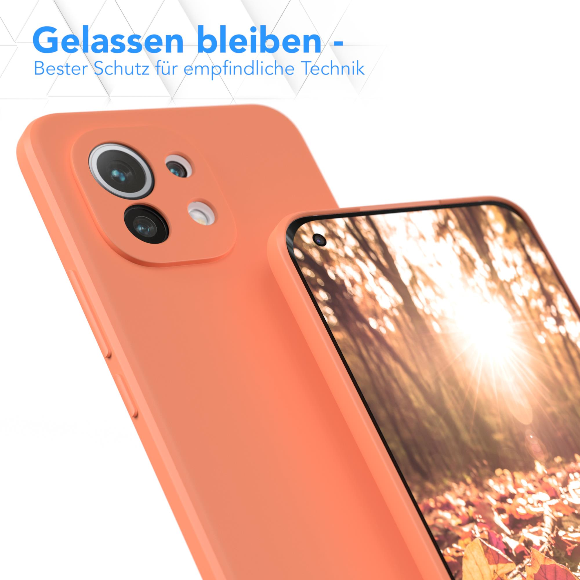 Eine orangefarbene Handyhülle schützt ein Telefon. Der Text oben lautet: 'Entspannt bleiben - Bester Schutz für empfindliche Technik'.