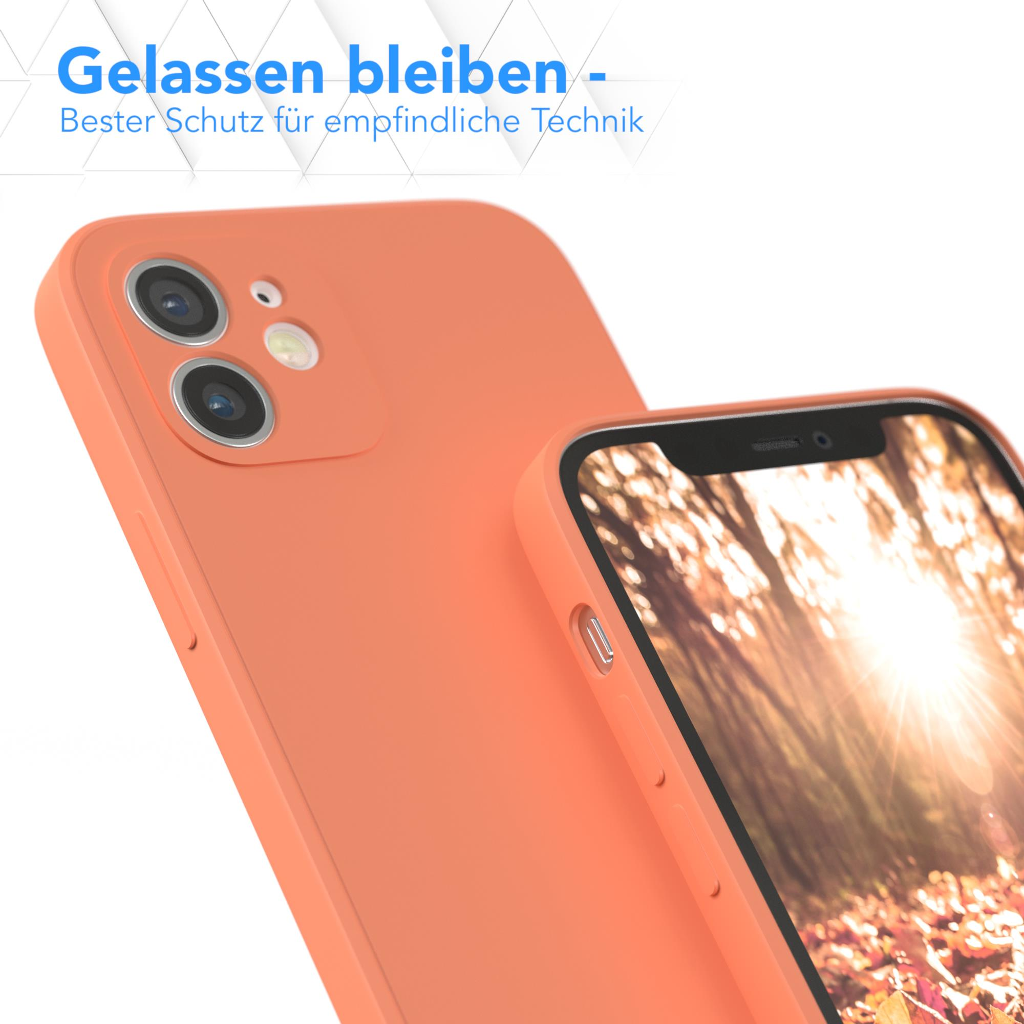 Pfirsichfarbene Handyhülle mit Smartphone. Der Hintergrund ist unscharf.