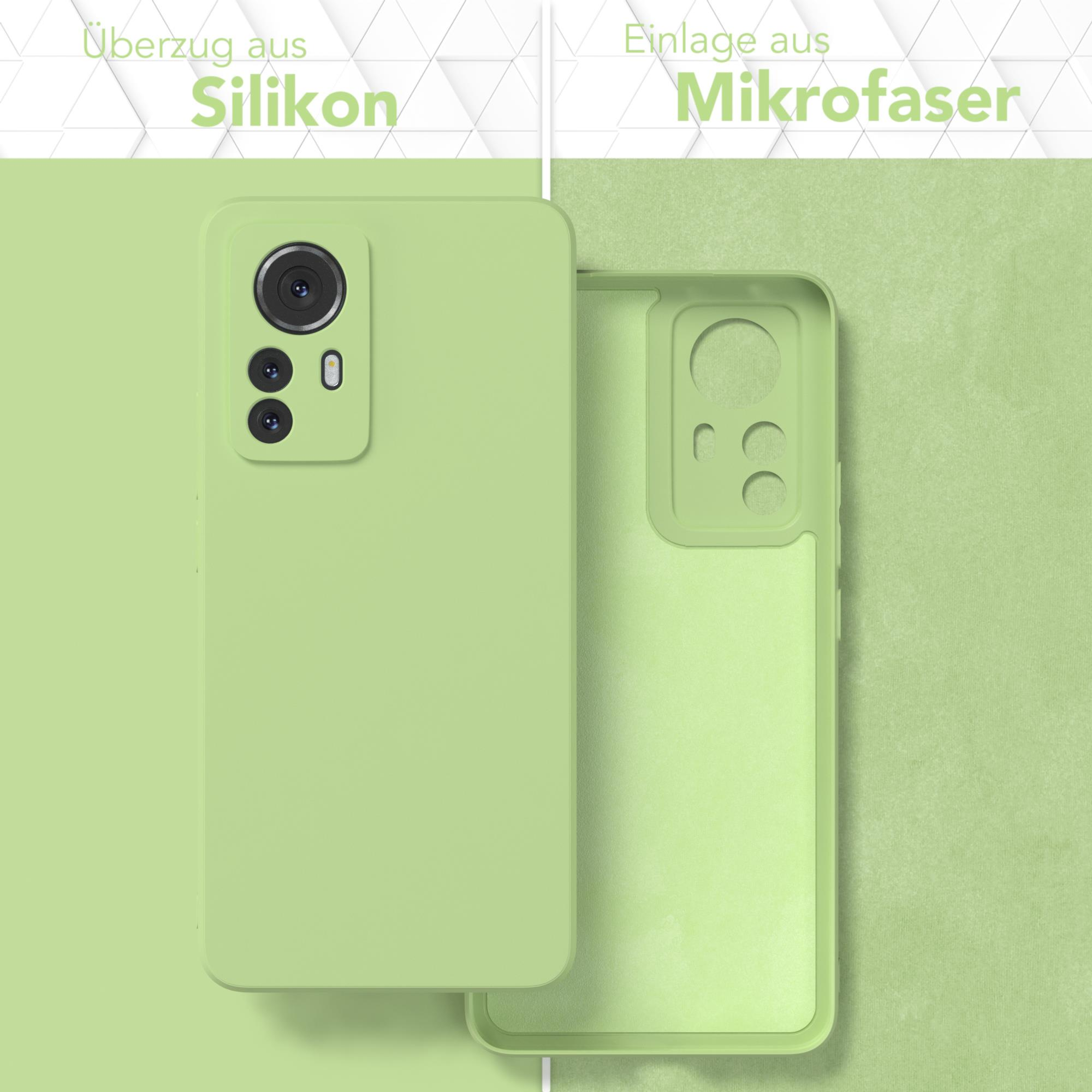 Grüne Handyhülle mit grünem Mikrofaser-Innenraum. Zeigt Hülle und Innenraum separat.