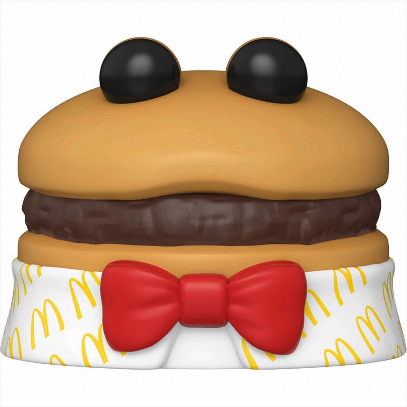 Ein burgerförmiges Spielzeug mit zwei schwarzen Augen, einer roten Fliege und einem weißen Hemd mit gelben Ms.