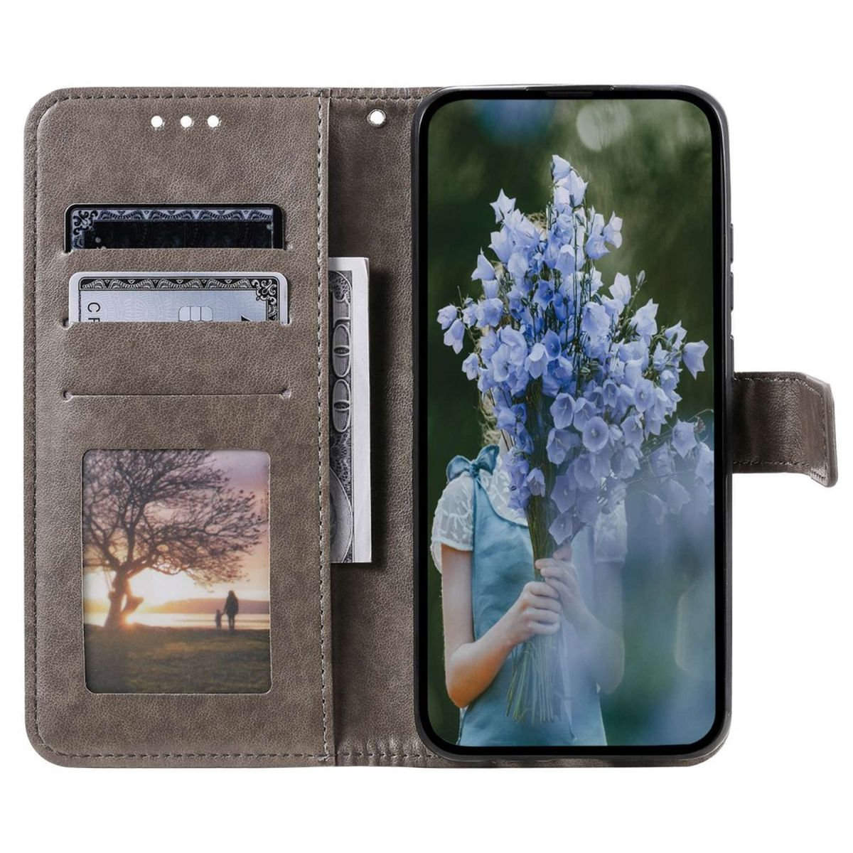 Graue Handyhülle mit einem Telefon darin. Das Telefon zeigt eine Frau mit blauen Blumen.