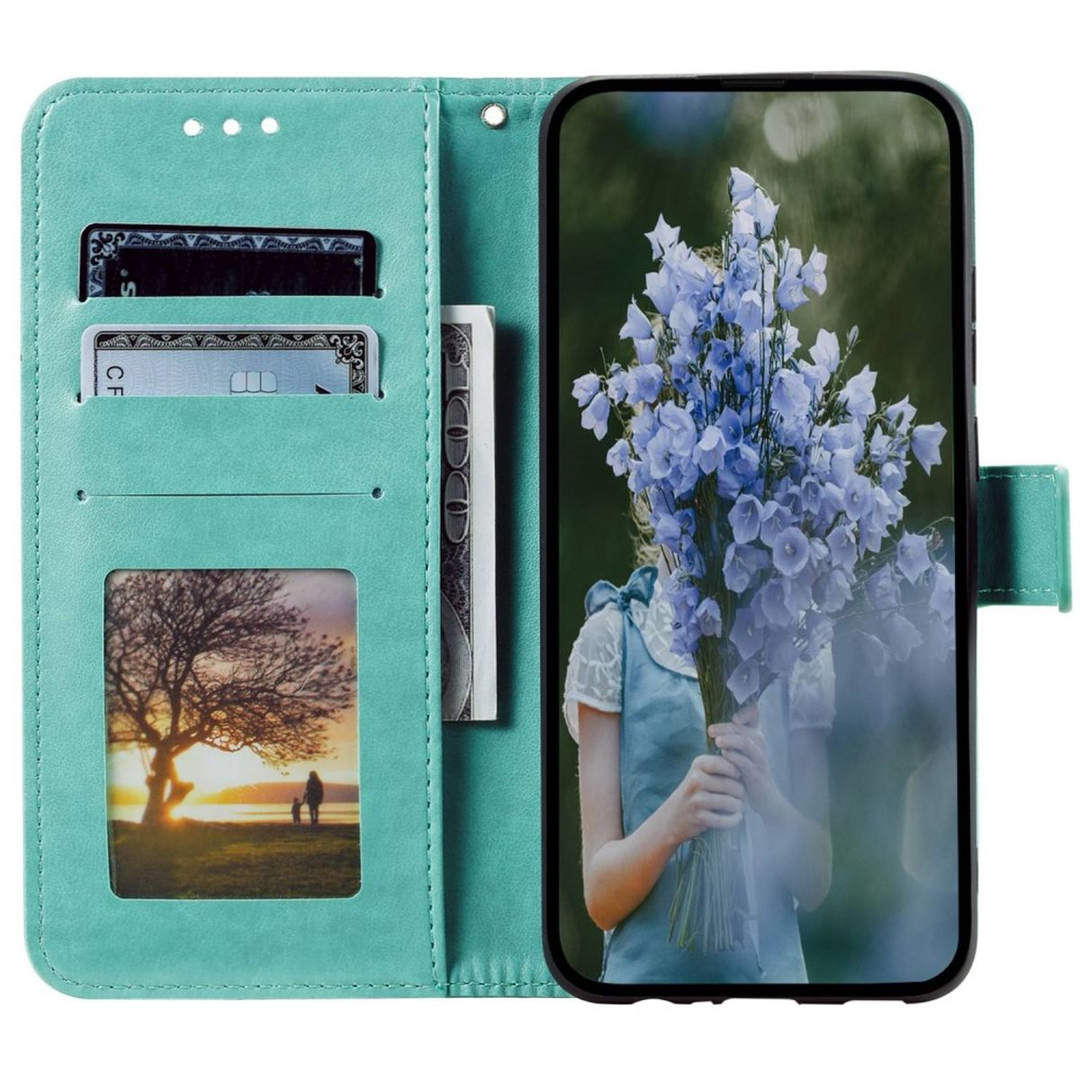 Türkisfarbene Handyhülle offen, zeigt Karten und ein Telefon mit blauem Blumenbild. Hintergrund unscharf.