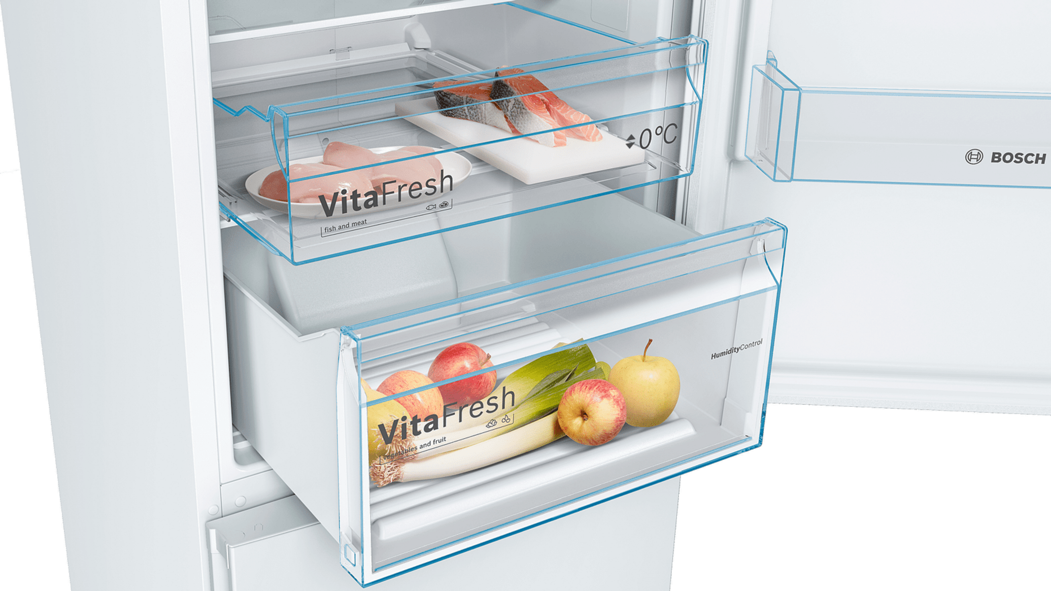 Wnętrze lodówki: szuflady na świeżą żywność z warzywami i rybami. Szuflady są przezroczyste i oznakowane.