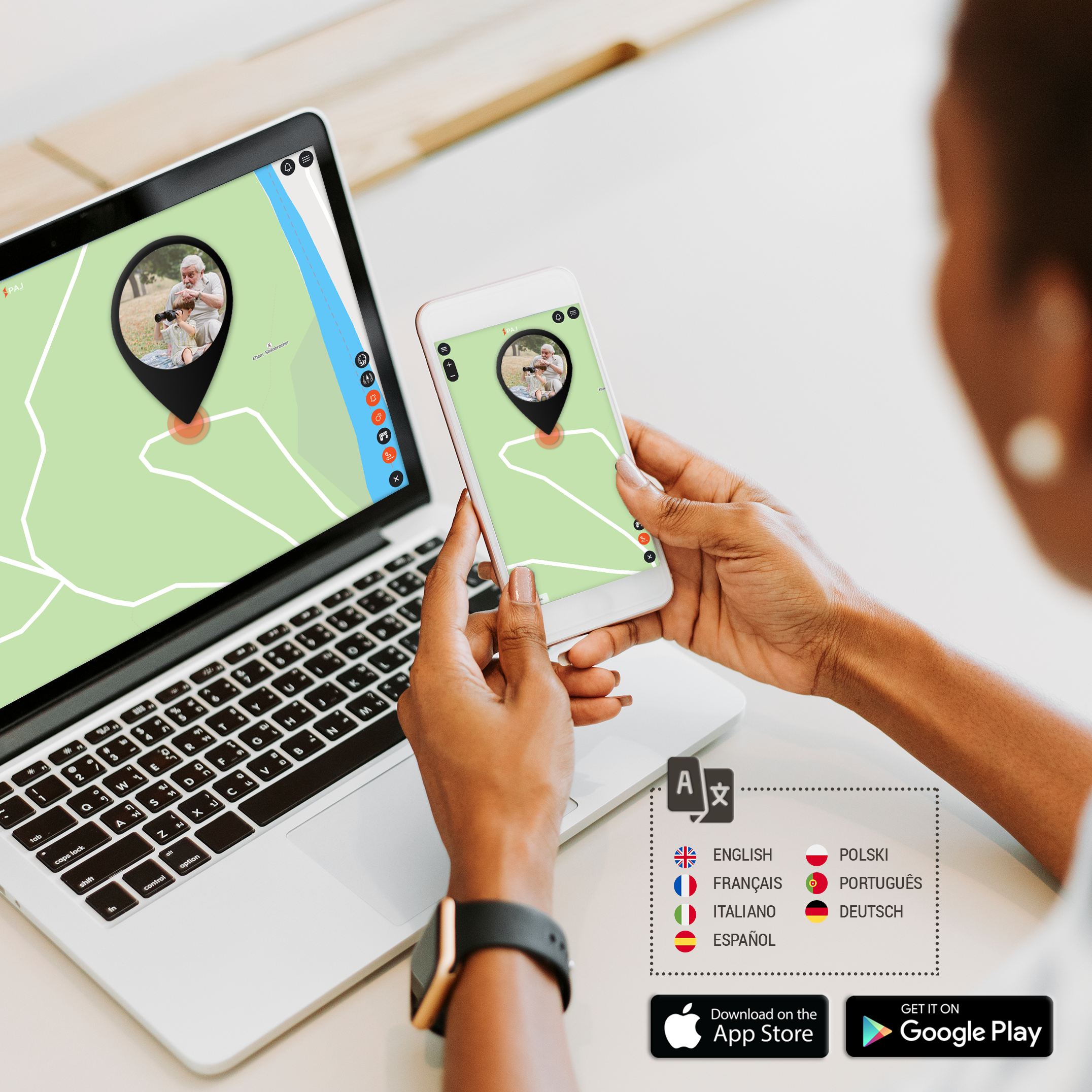 Person benutzt Telefon mit Karten-App, Laptop und App-Download-Symbolen.