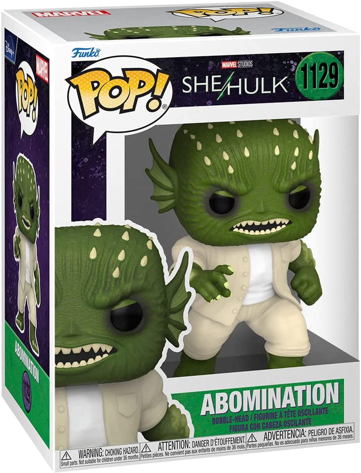 Una figura di Abominio di She-Hulk in una scatola. La figura è verde con macchie bianche e indossa un abito.