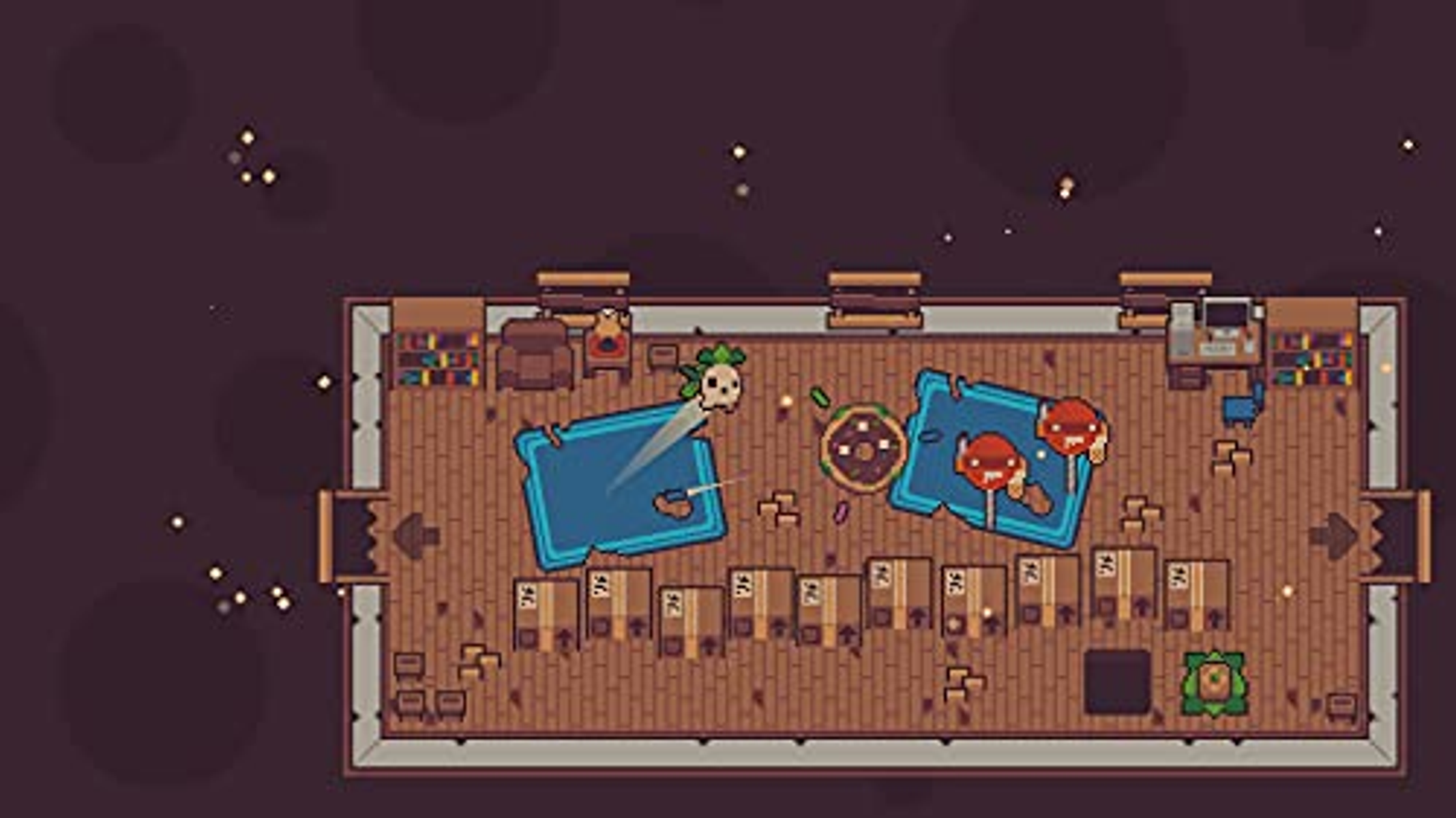 Vista dall'alto di una tavola calda pixelata. Sono visibili tavoli, sedie e una cucina.
