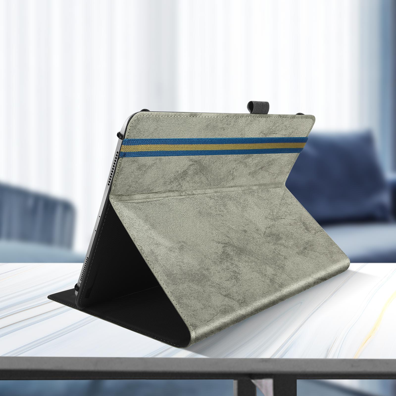 Custodia grigia per tablet, aperta, con strisce blu e oro sopra.