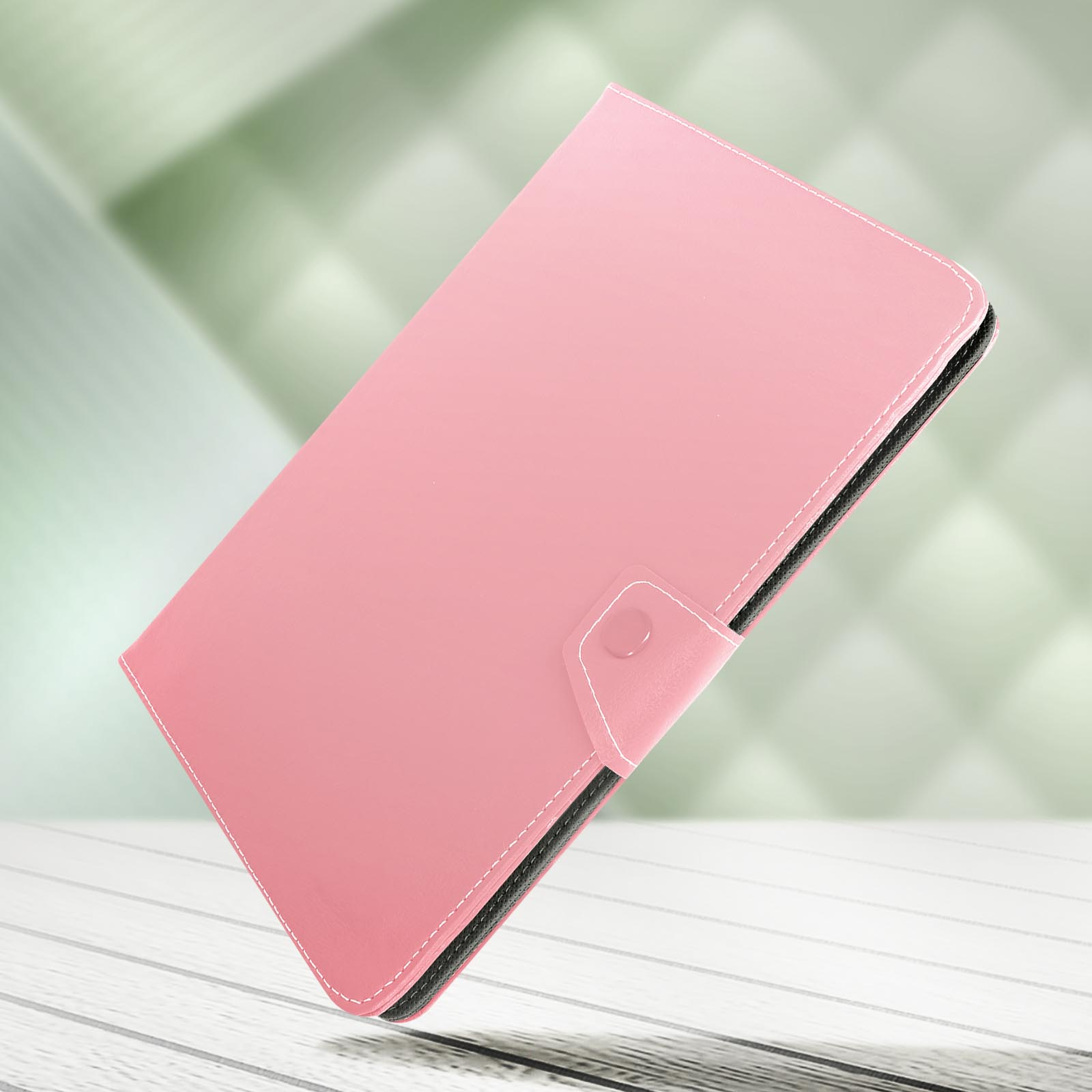 Custodia rosa per tablet con cuciture bianche. Bordi neri. Sfondo bianco.