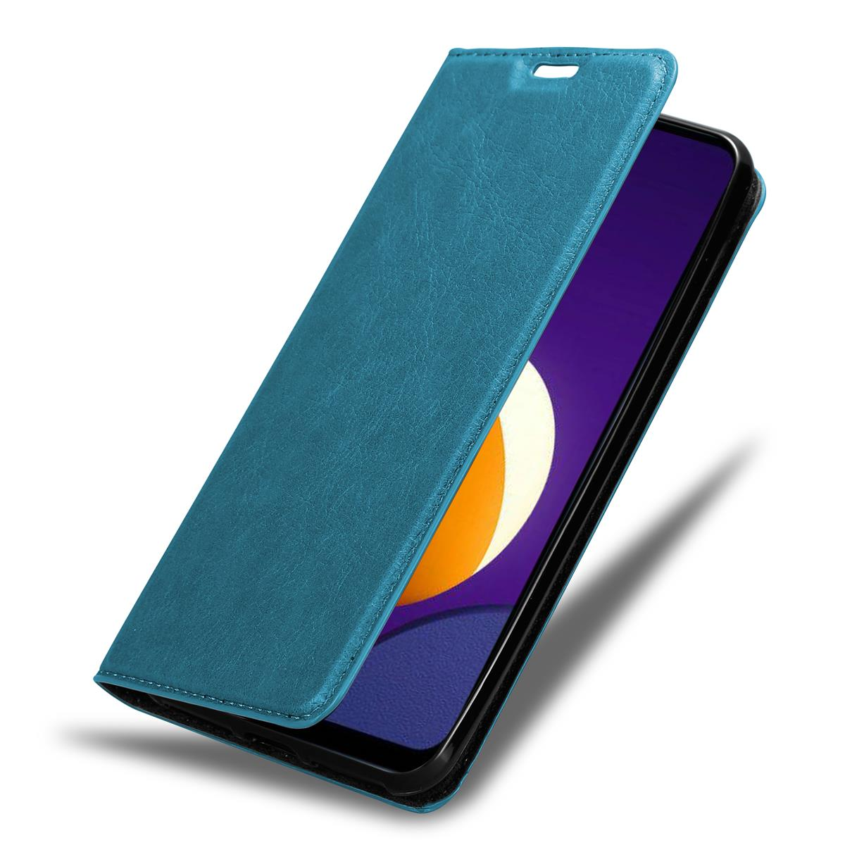 Blaue Handyhülle geöffnet, zeigt ein Handy. Türkis-Deckel, zeigt den Bildschirm.
