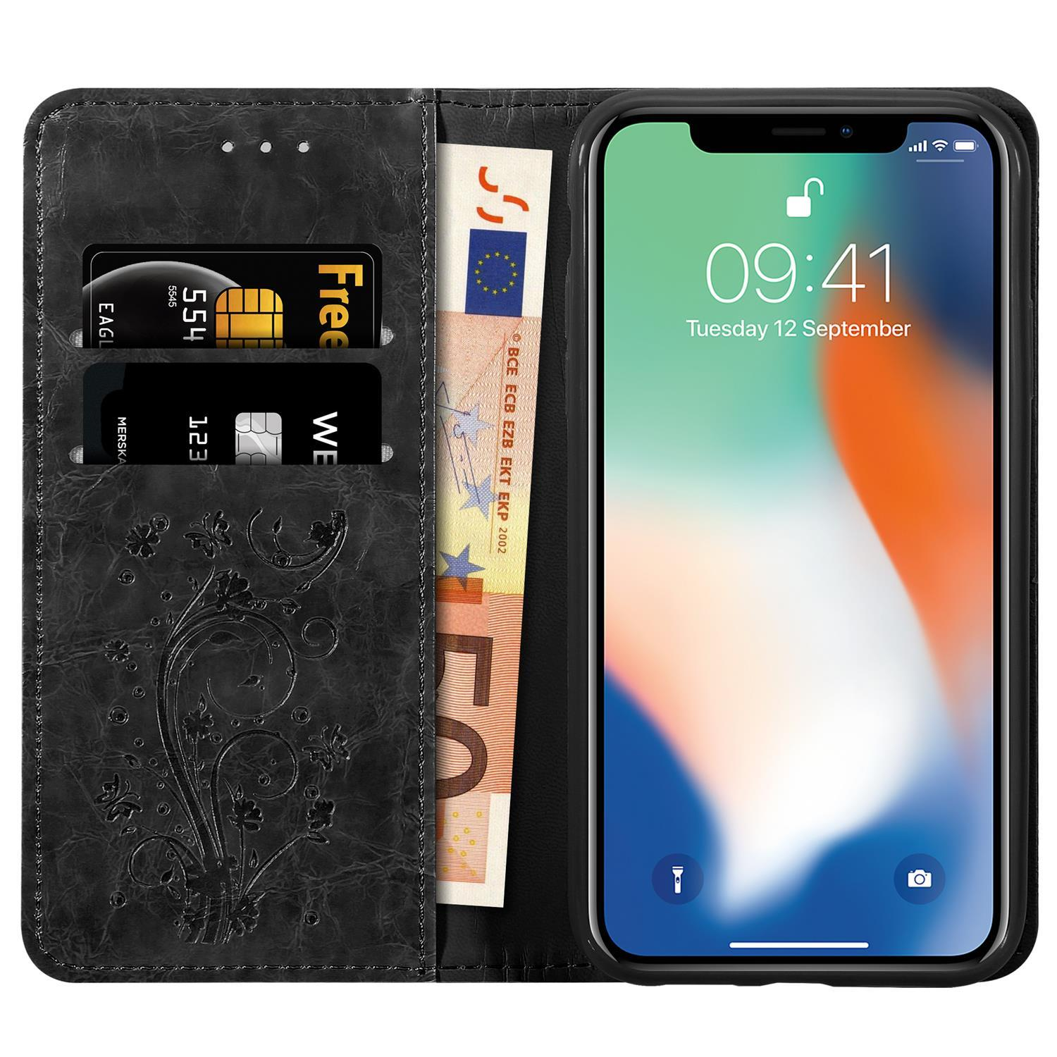 Schwarze Handyhülle mit Karten- und Geldfächern. Ein iPhone ist innen.
