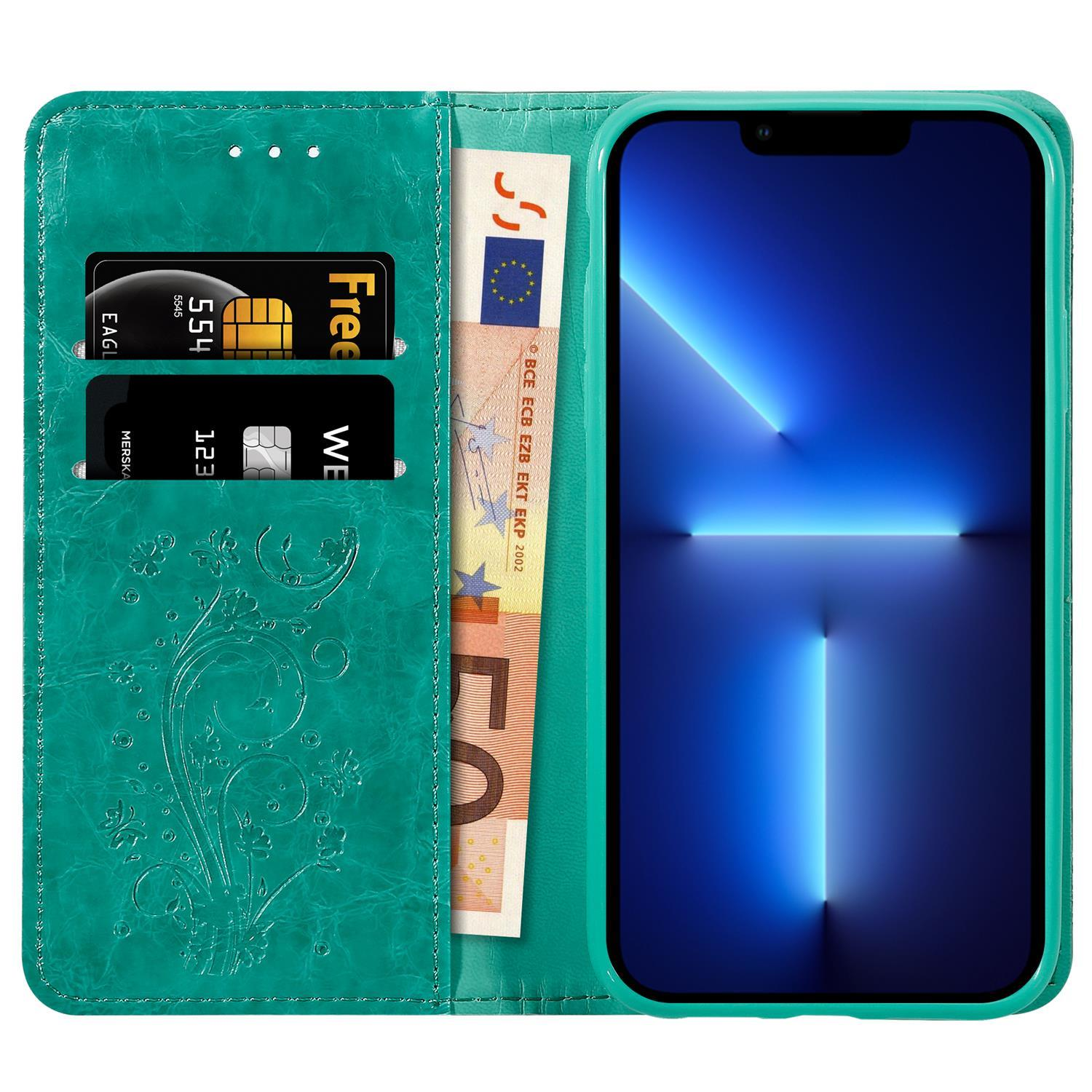 Eine Handyhülle mit Karten und Geld. Ein Telefonbildschirm zeigt einen blauen Farbverlauf.