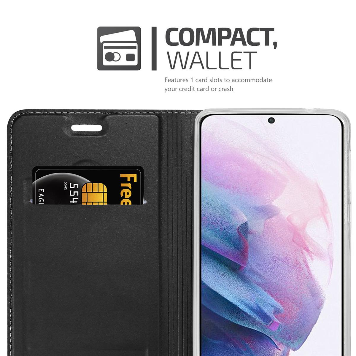 Una custodia per telefono nera a portafoglio con uno slot per carte che contiene una carta di credito oro e nera.