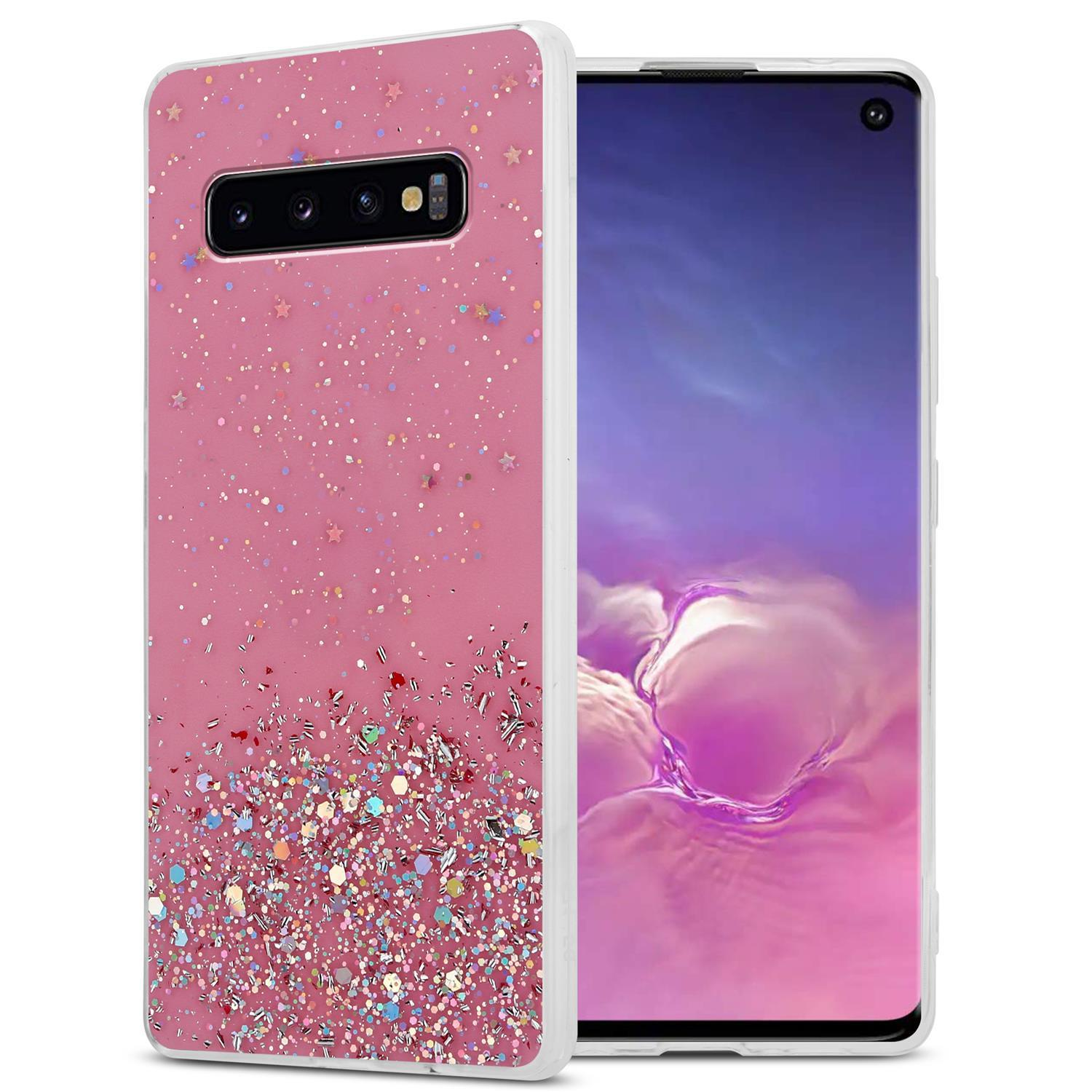 Rosa Handyhülle mit Glitzer auf einem Telefon. Der Bildschirm zeigt rosa und blauen, verschwommenen Hintergrund.