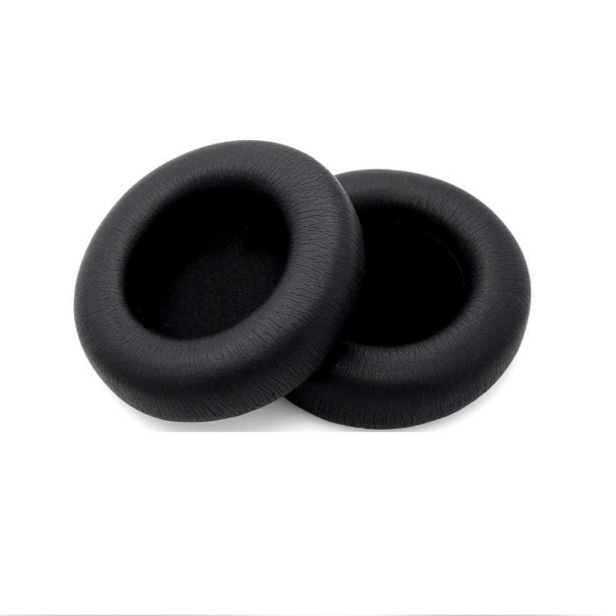 Dwie czarne, okrągłe wkładki do uszu. Grube i miękkie, do słuchawek.