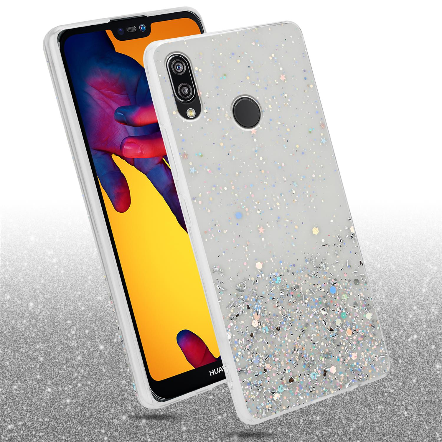 Ein Smartphone in einer weißen Glitzerhülle, mit einem anderen Telefon, dessen Bildschirm sichtbar ist.