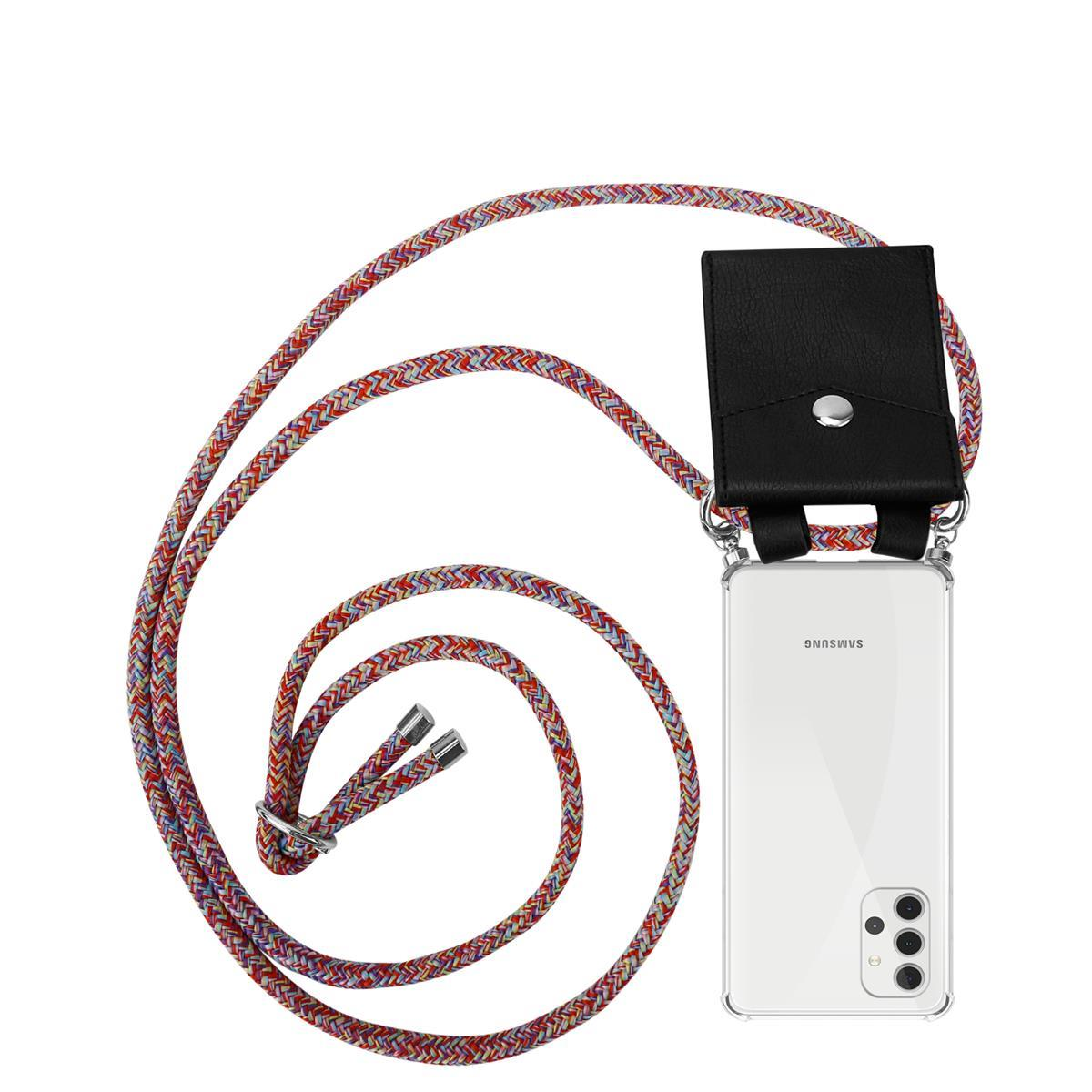 Telefon in klarer Hülle mit farbenfrohem Band. Schwarzer Leder-Telefonkartenhalter.