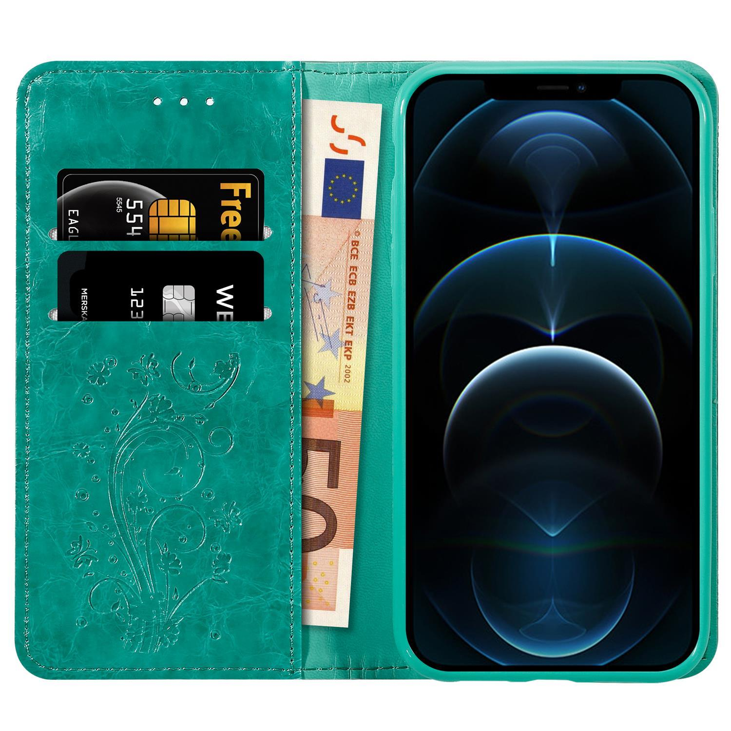 Custodia a portafoglio turchese con carte e contanti all'interno. Design floreale sul davanti, telefono a destra.