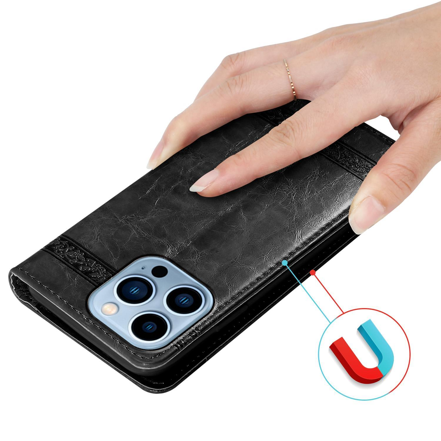 Eine Hand, die eine schwarze Leder-Handyhülle mit einem Handy darin hält. Ein Magnetsymbol ist ebenfalls vorhanden.
