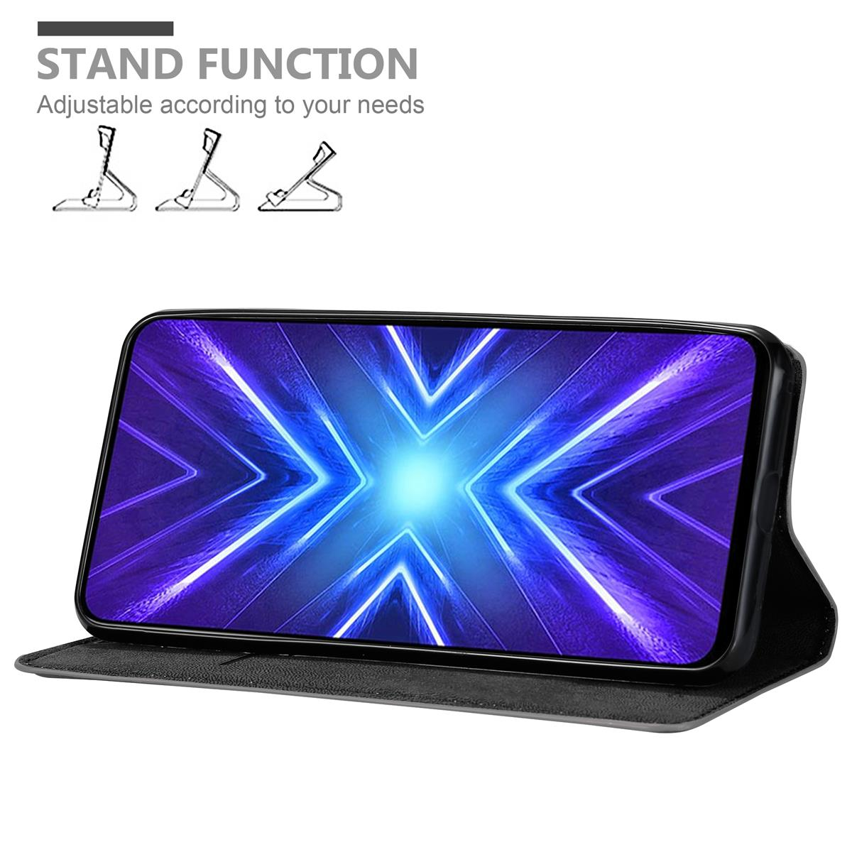 Ein Telefon in einer schwarzen Hülle, der Bildschirm zeigt ein blaues und violettes Design.