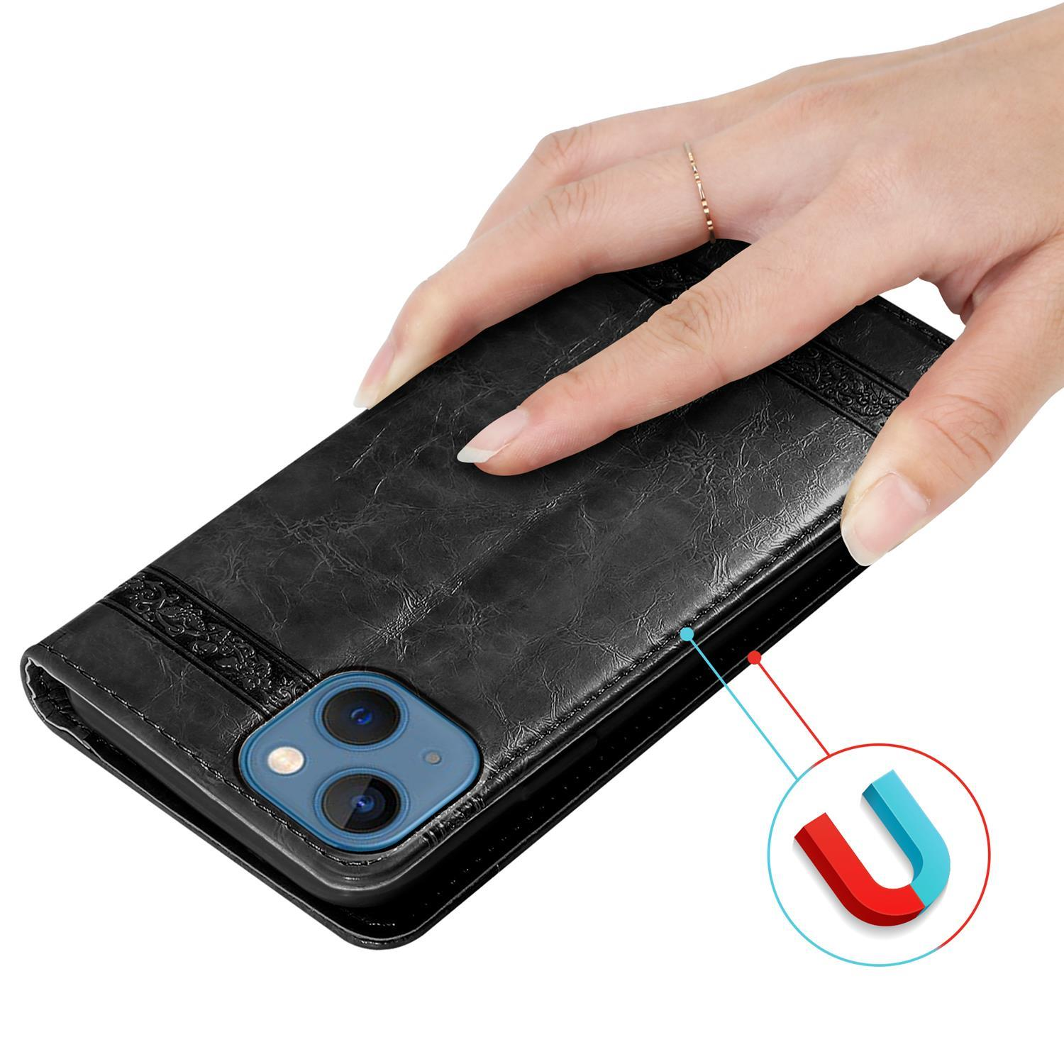 Hand hält schwarze Handyhülle mit Magnetfunktion.
